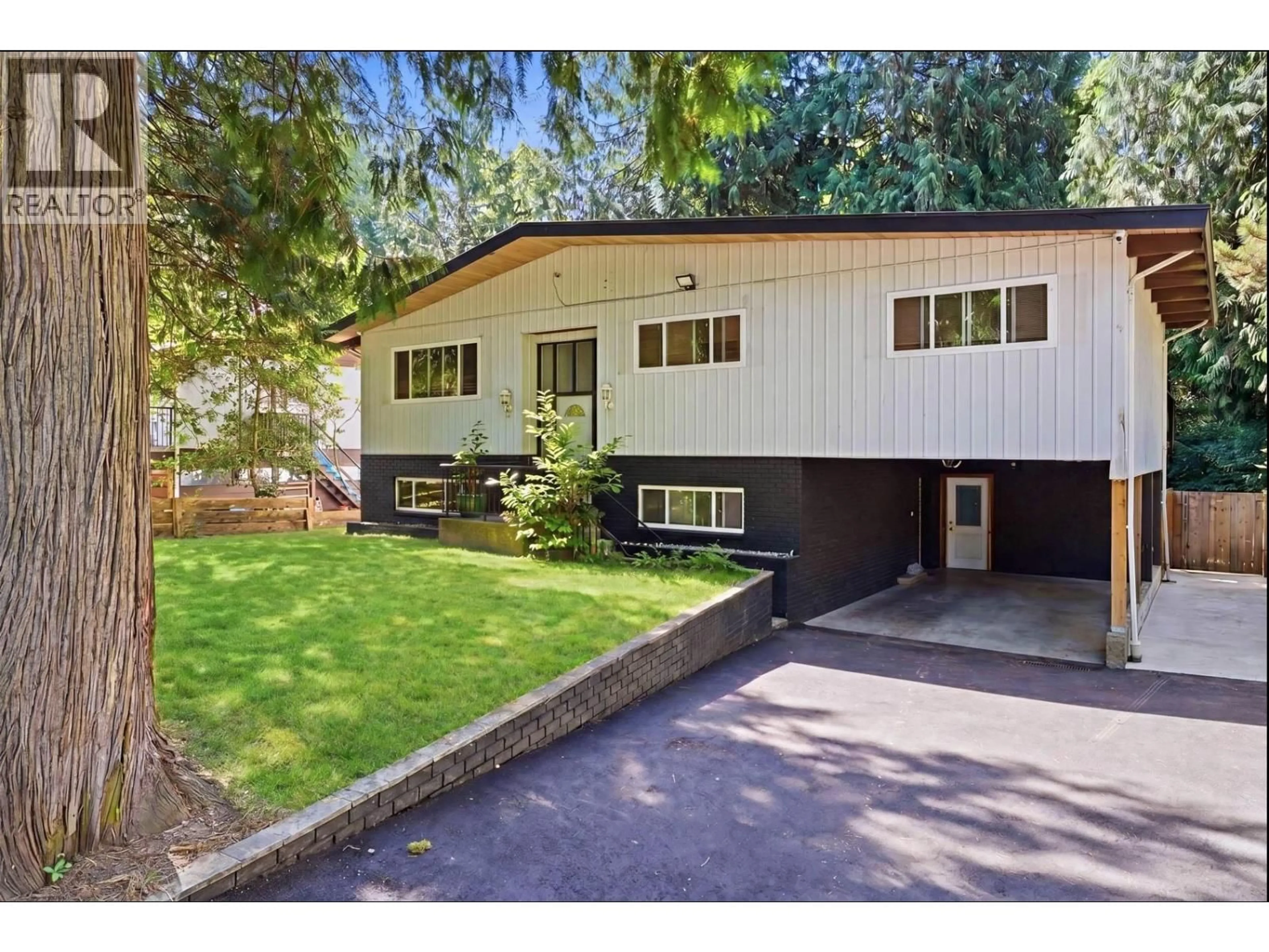 Home with vinyl exterior material, street for 1707 DEMPSEY ROAD, North Vancouver British Columbia V7K1T2