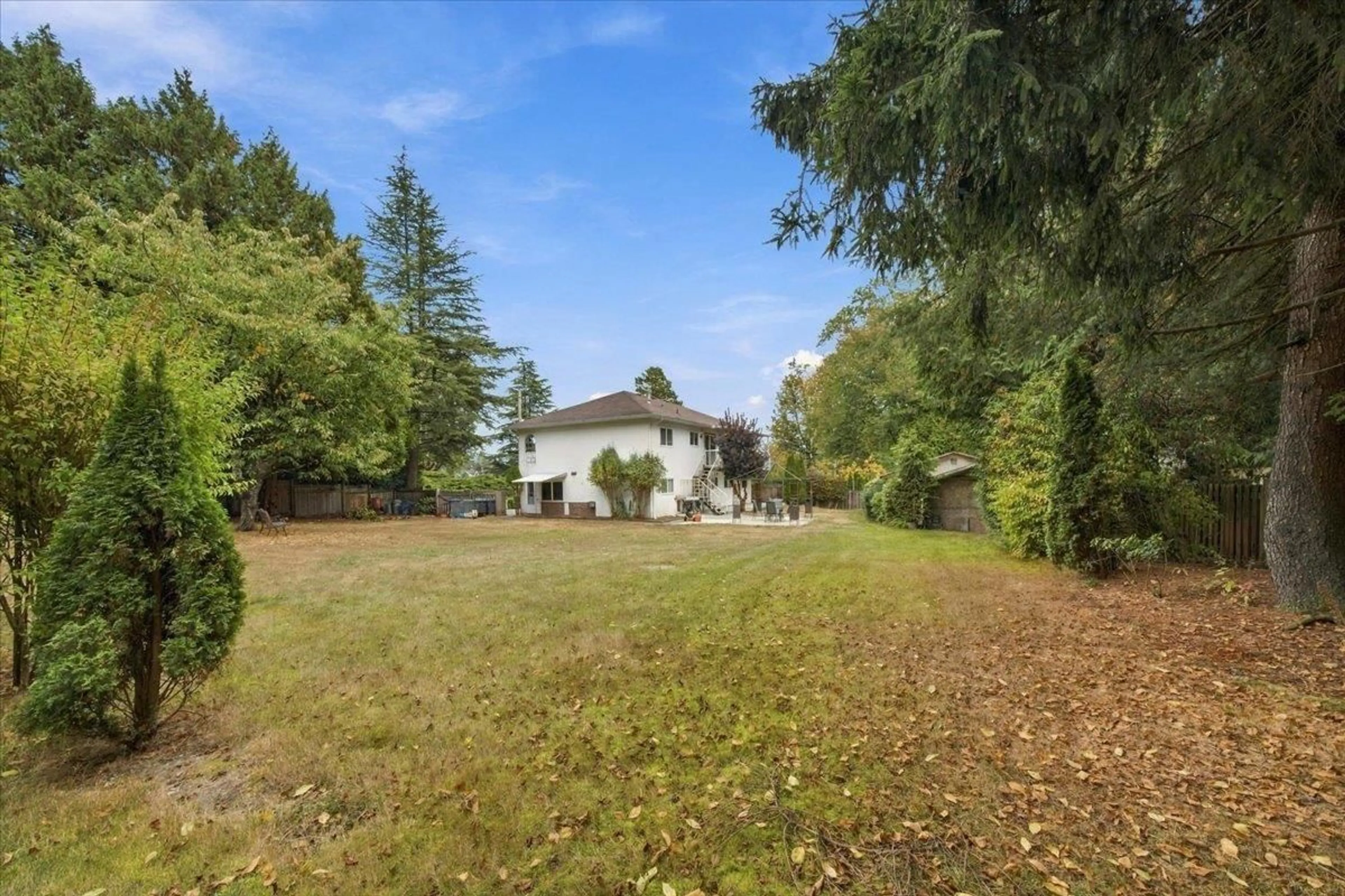 A pic from outside/outdoor area/front of a property/back of a property/a pic from drone, forest/trees view for 14790 55 AVENUE, Surrey British Columbia V3S1A9