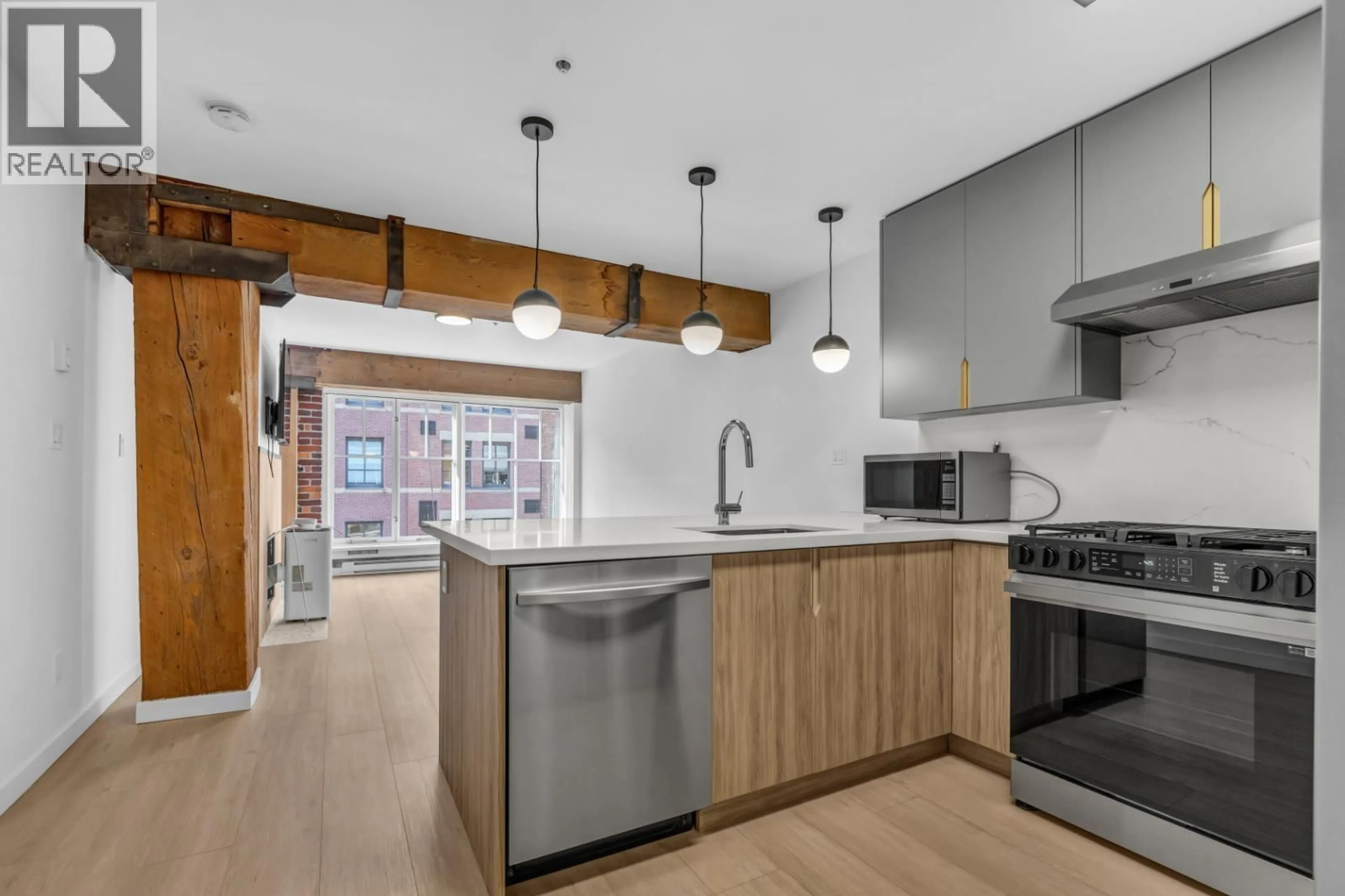 Open concept kitchen, unknown for 402 - 1178 HAMILTON STREET, Vancouver British Columbia V6B2S2