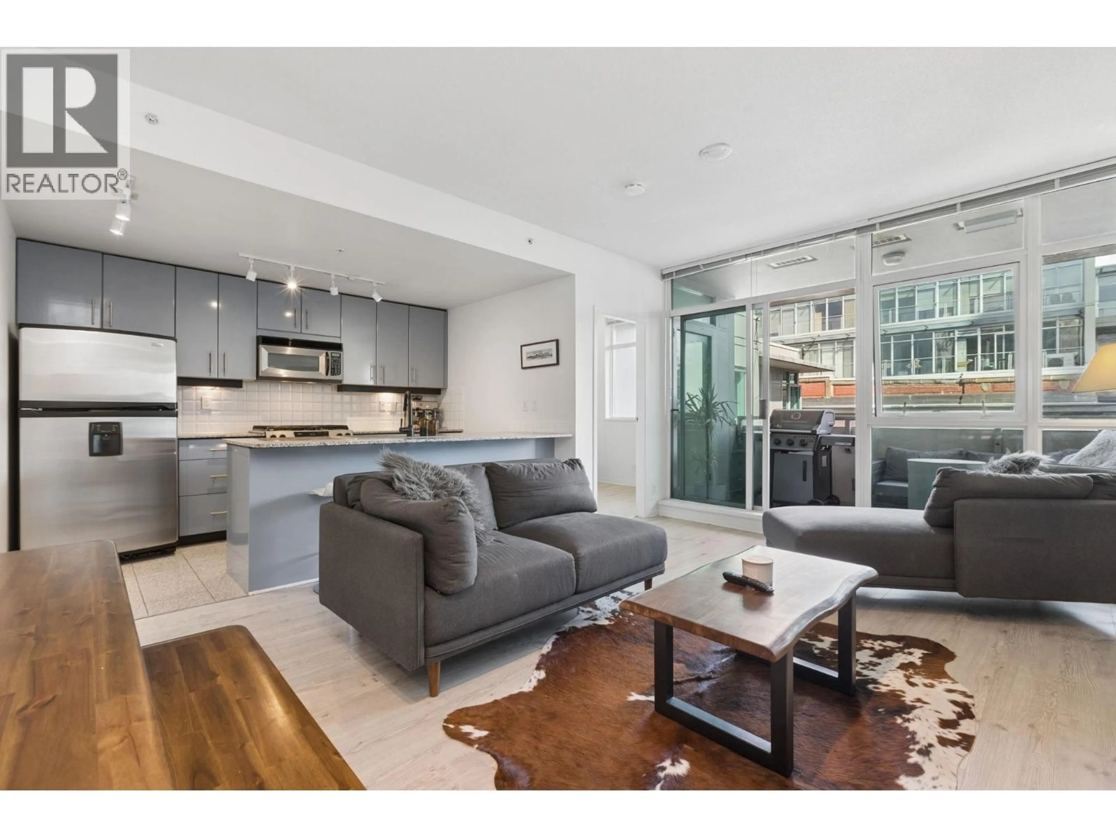 Living room with furniture, unknown for PH 601 - 100 ESPLANADE, North Vancouver British Columbia V7L4V1