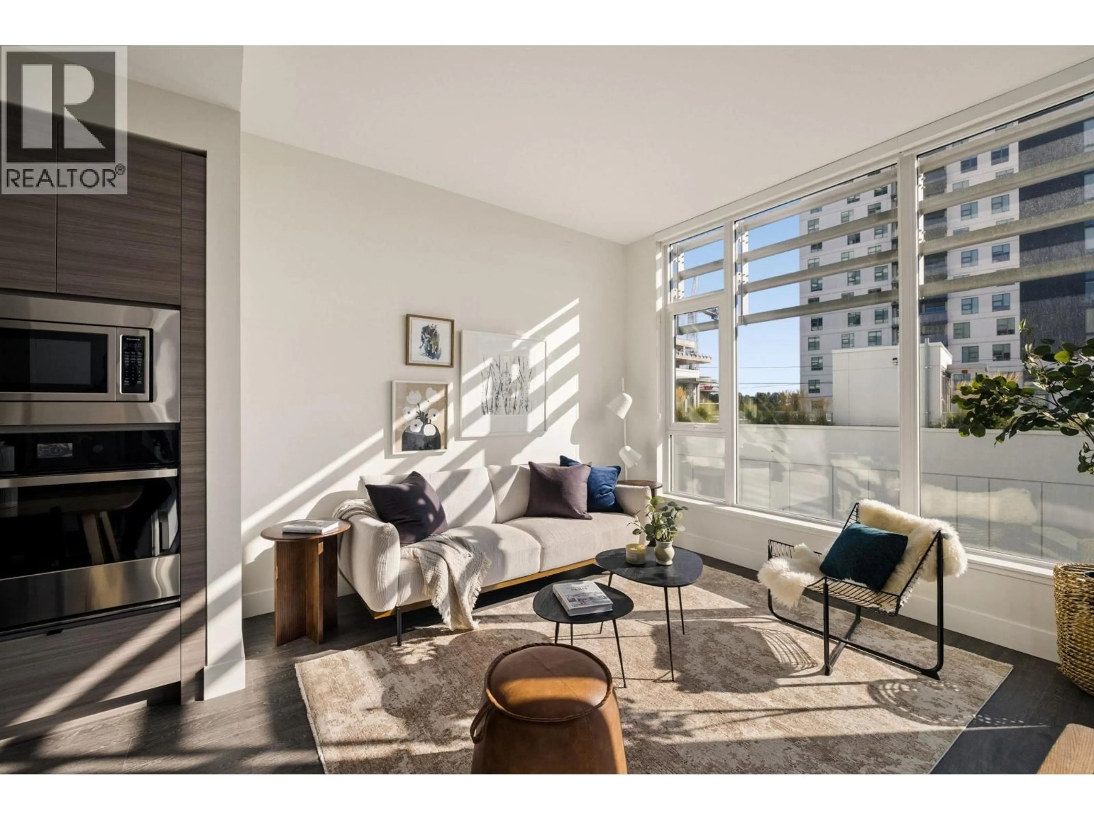 Living room with furniture, unknown for 407 - 3438 SAWMILL CRESCENT, Vancouver British Columbia V5S0E3