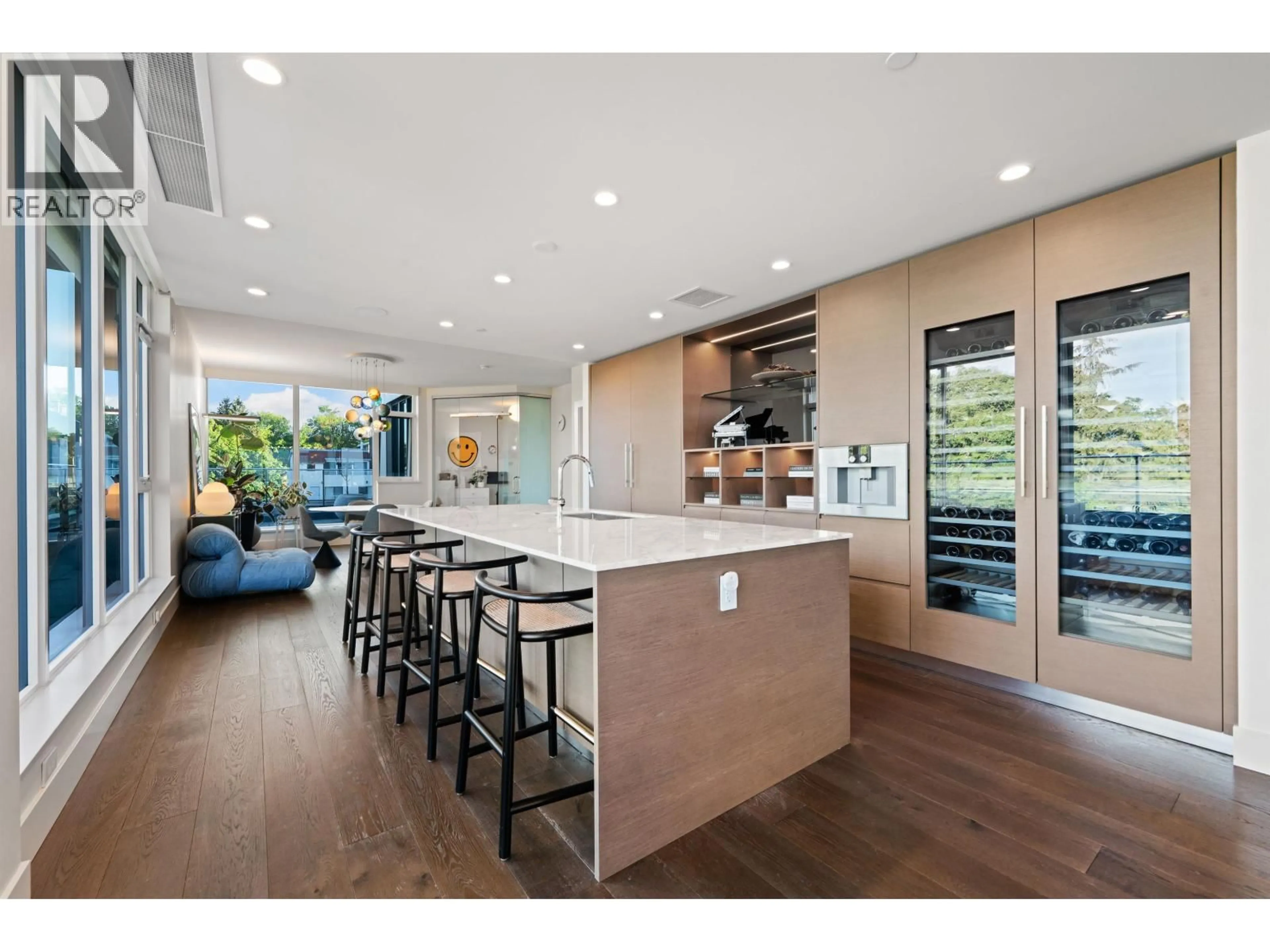 Open concept kitchen, wood/laminate floor for 403 - 3639 16TH AVENUE, Vancouver British Columbia V6R3C3
