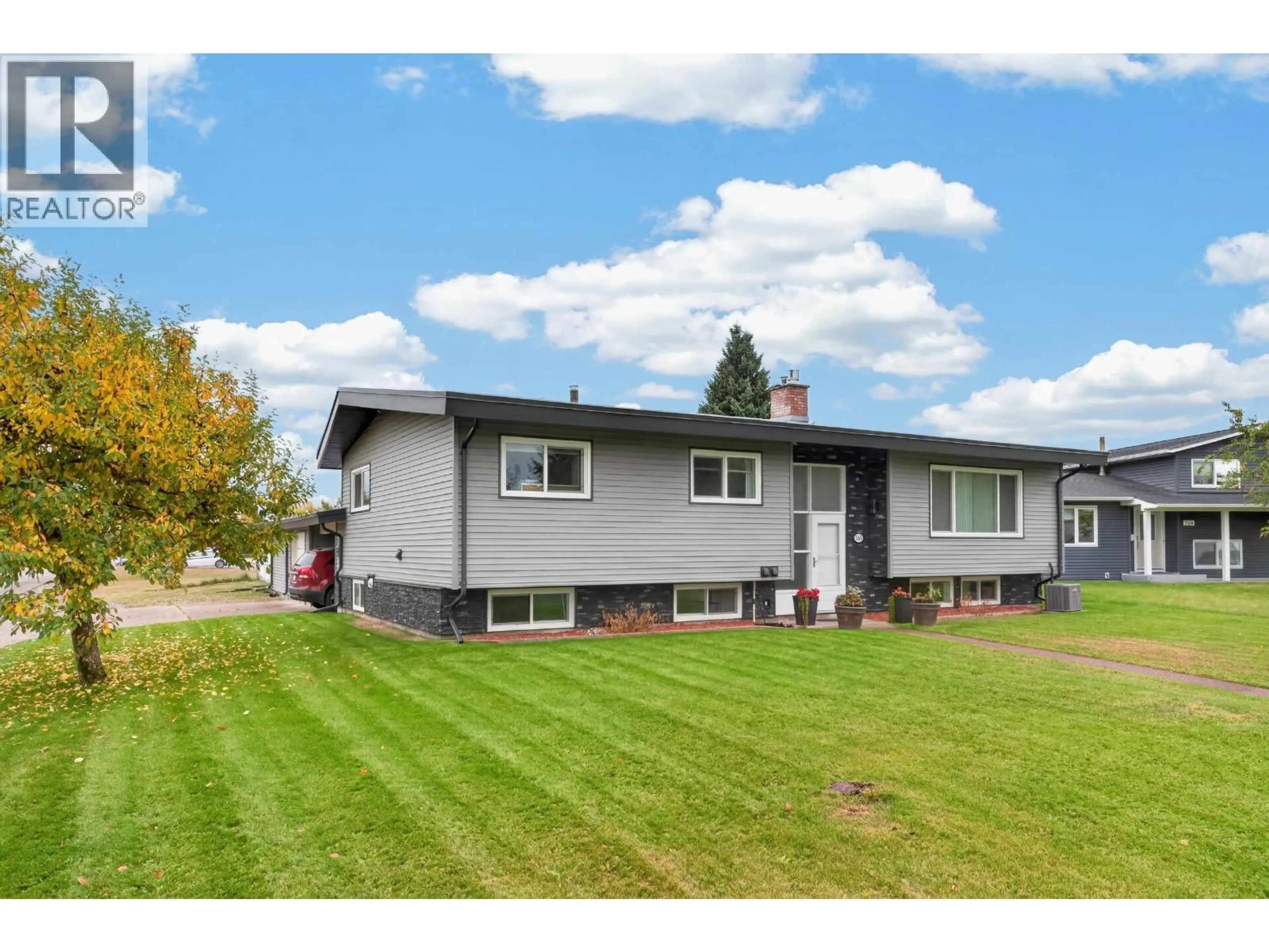 Home with vinyl exterior material, street for 163 PARKER DRIVE, Prince George British Columbia V2M4S7