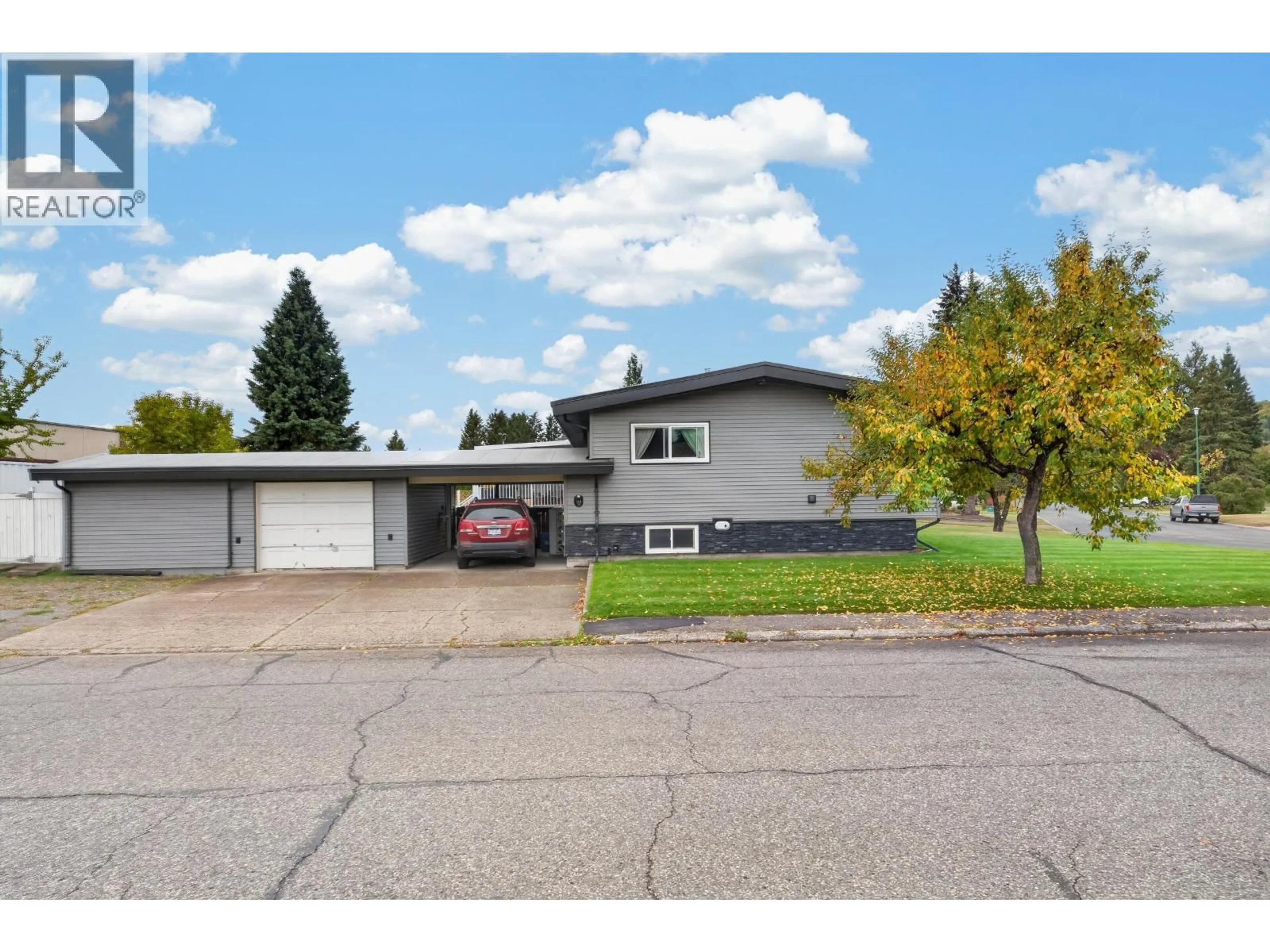 Home with vinyl exterior material, street for 163 PARKER DRIVE, Prince George British Columbia V2M4S7