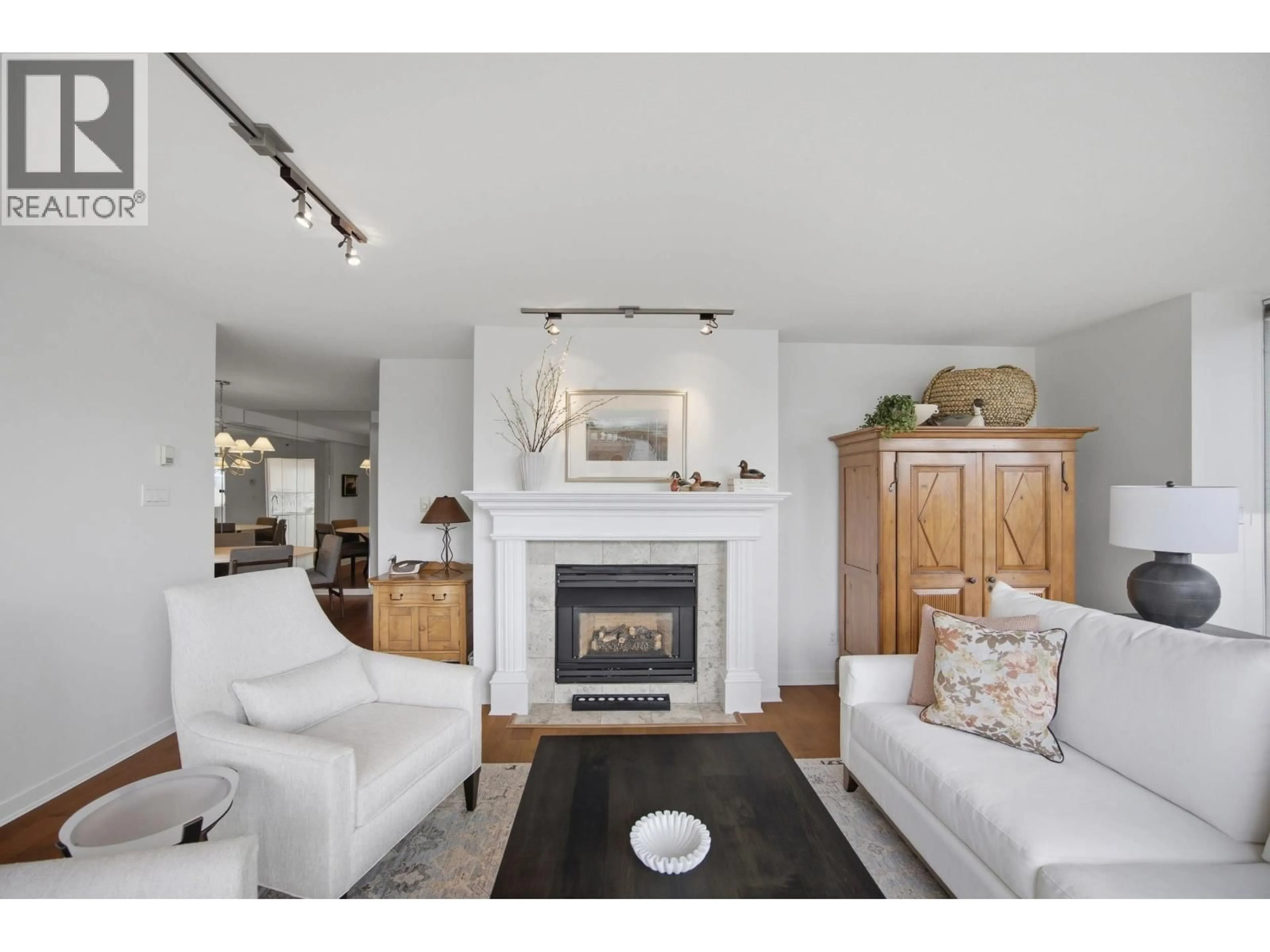 Living room with furniture, wood/laminate floor for 706 - 1500 HORNBY STREET, Vancouver British Columbia V6Z2R1