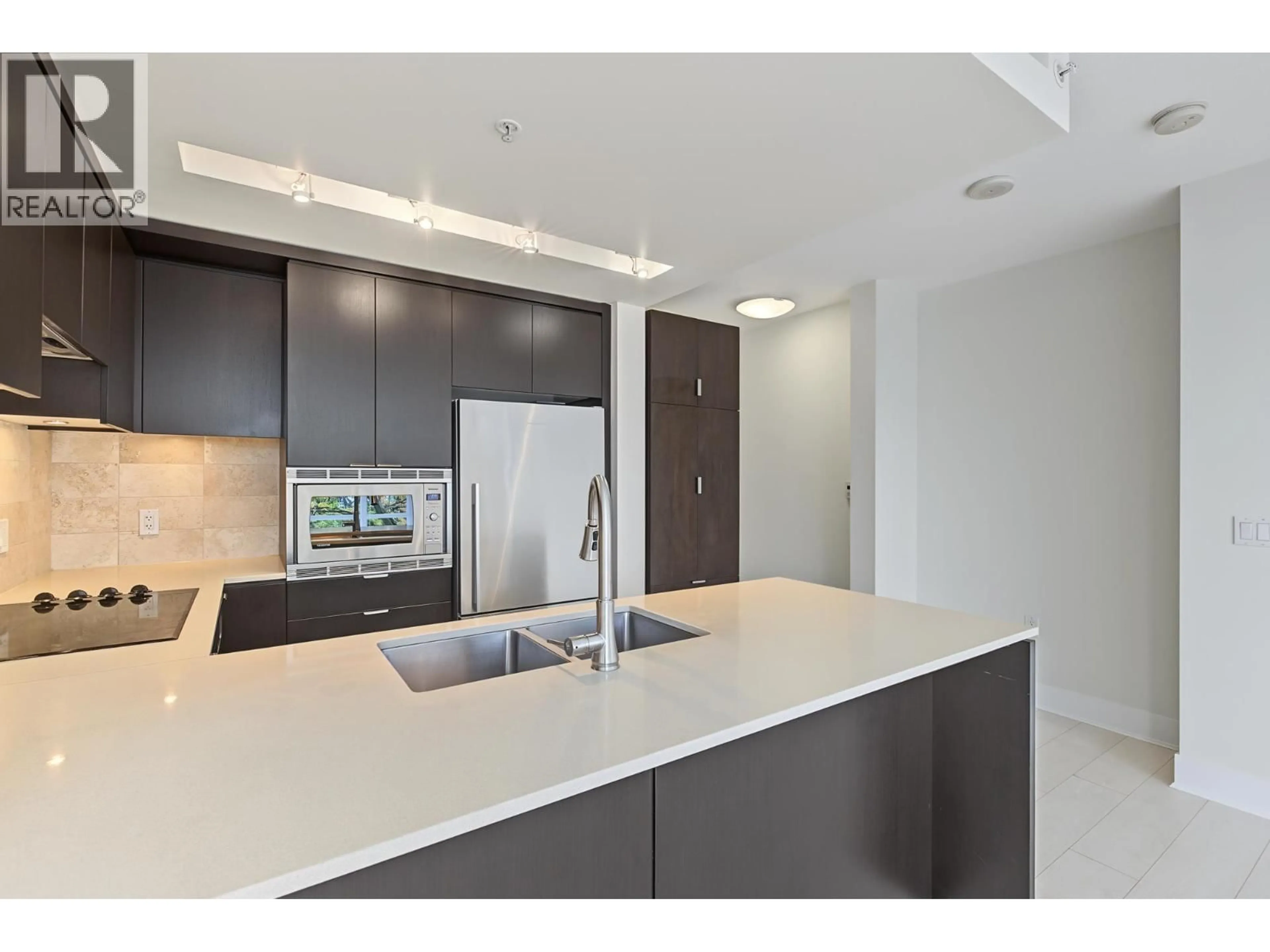 Open concept kitchen, unknown for 408 - 158 13TH STREET, North Vancouver British Columbia V7M0A7
