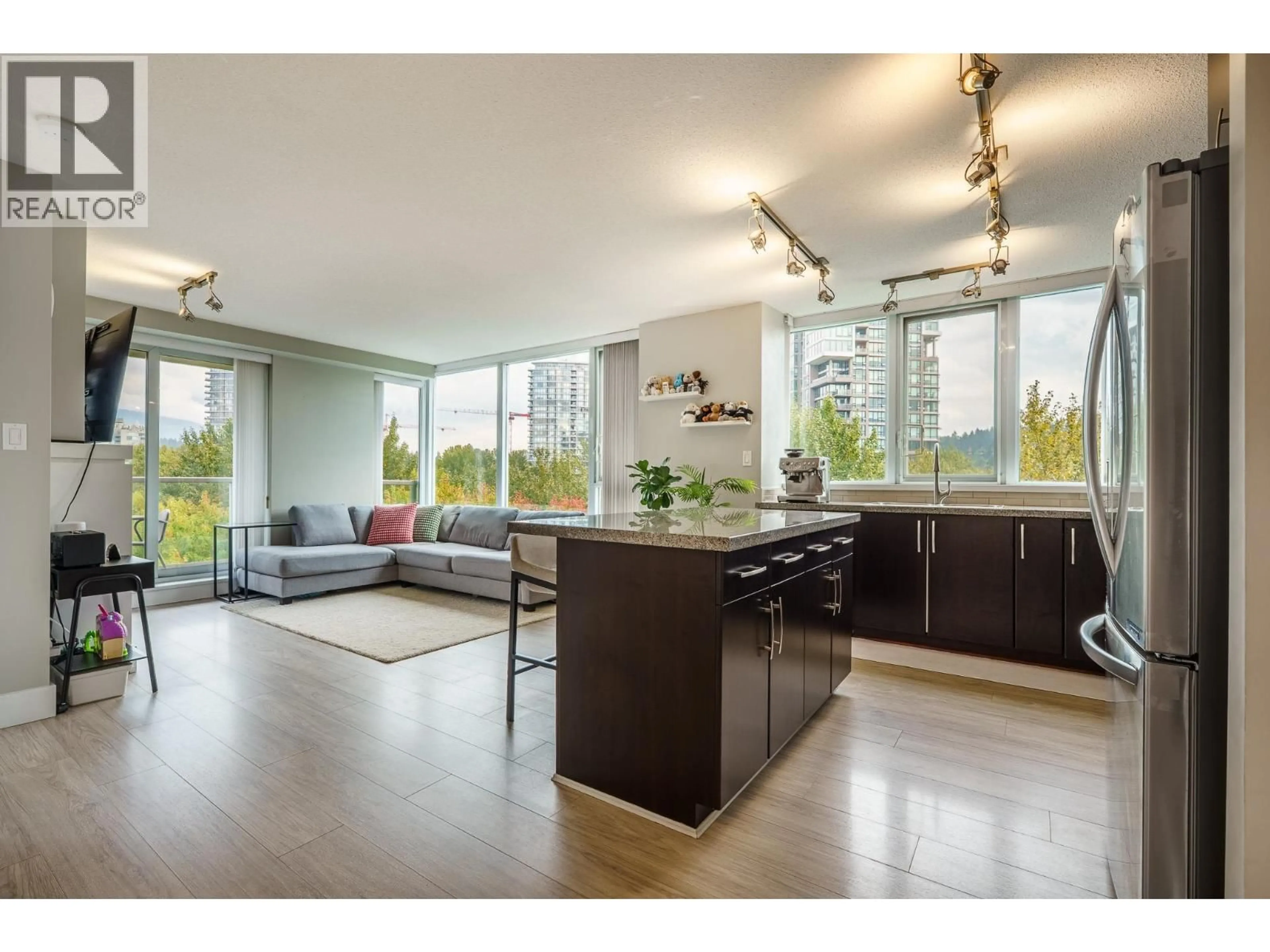 Open concept kitchen, wood/laminate floor for 1208 - 660 NOOTKA WAY, Port Moody British Columbia V3H0B7
