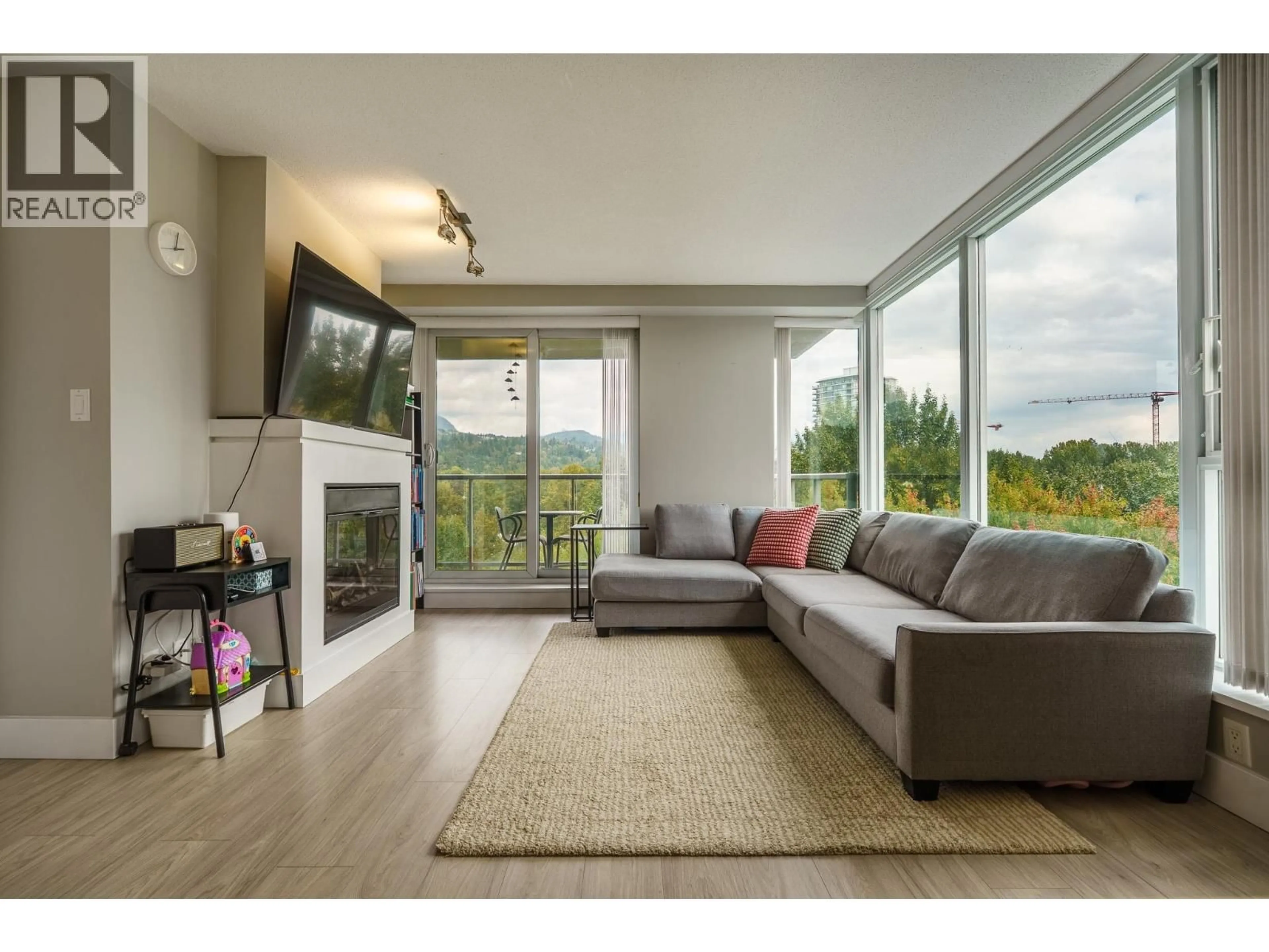 Living room with furniture, unknown for 1208 - 660 NOOTKA WAY, Port Moody British Columbia V3H0B7