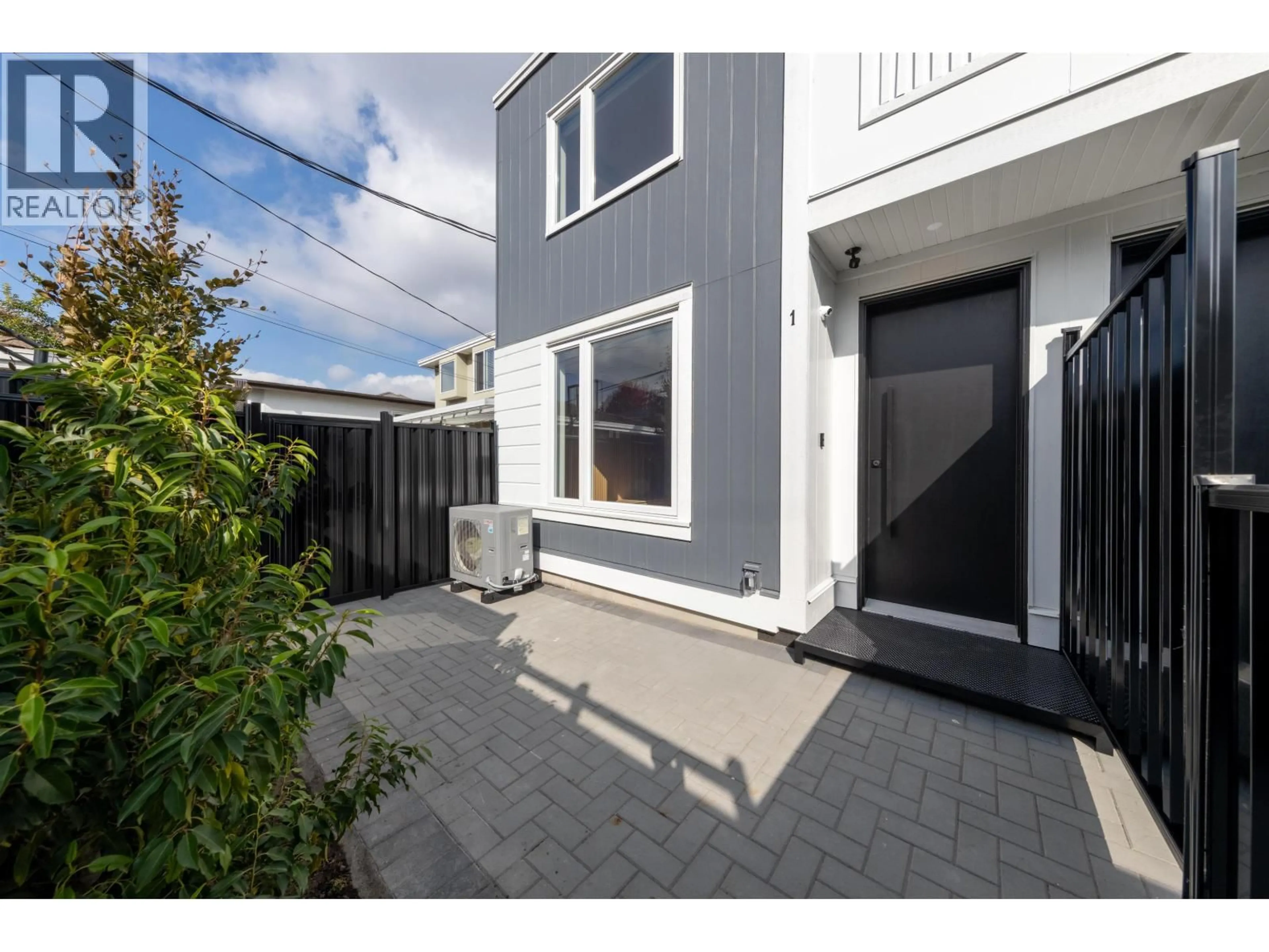 A pic from outside/outdoor area/front of a property/back of a property/a pic from drone, street for 1 - 3268 18 AVENUE, Vancouver British Columbia V5M2R7