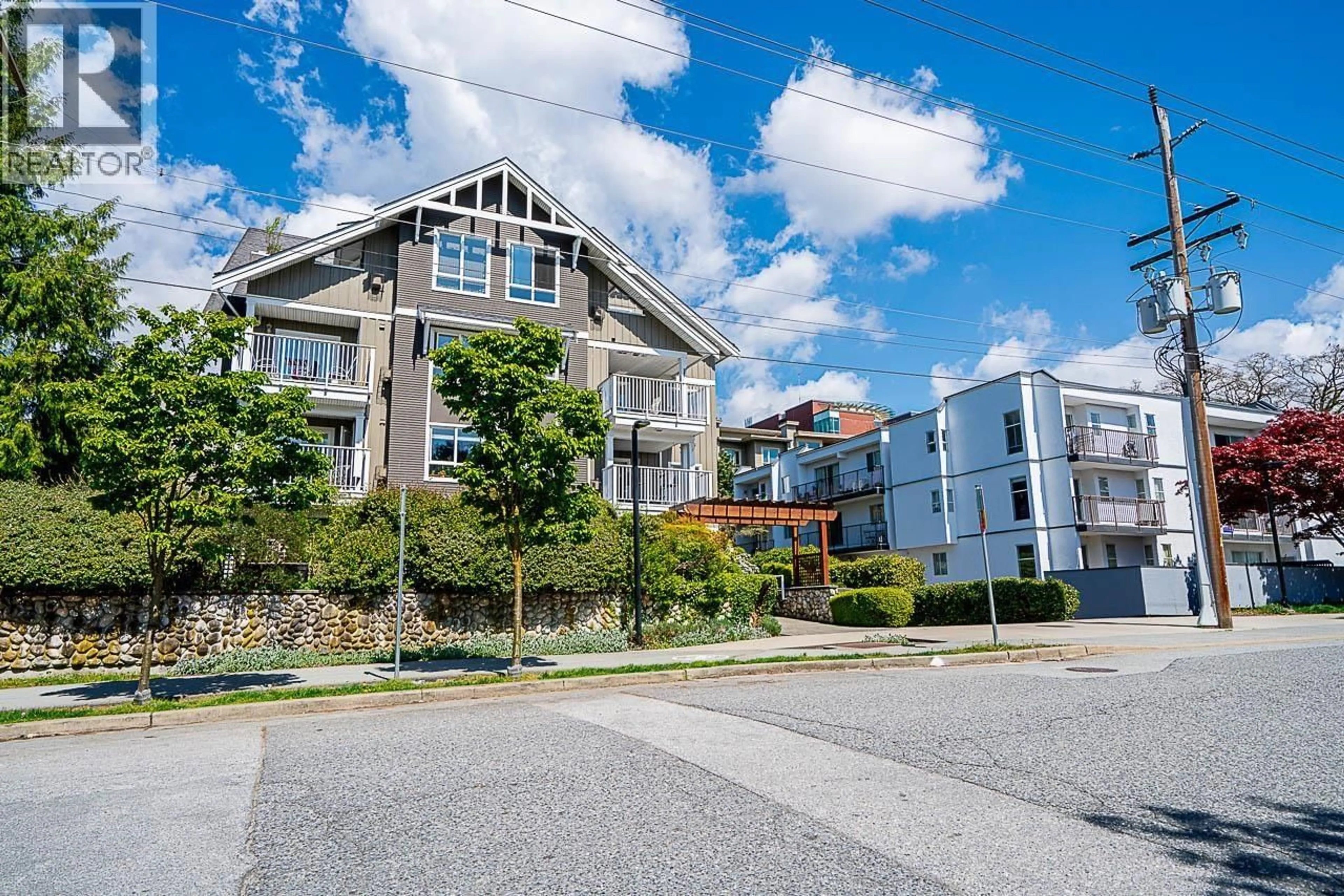 A pic from outside/outdoor area/front of a property/back of a property/a pic from drone, unknown for 302 - 128 21ST STREET, North Vancouver British Columbia V7M1Y9