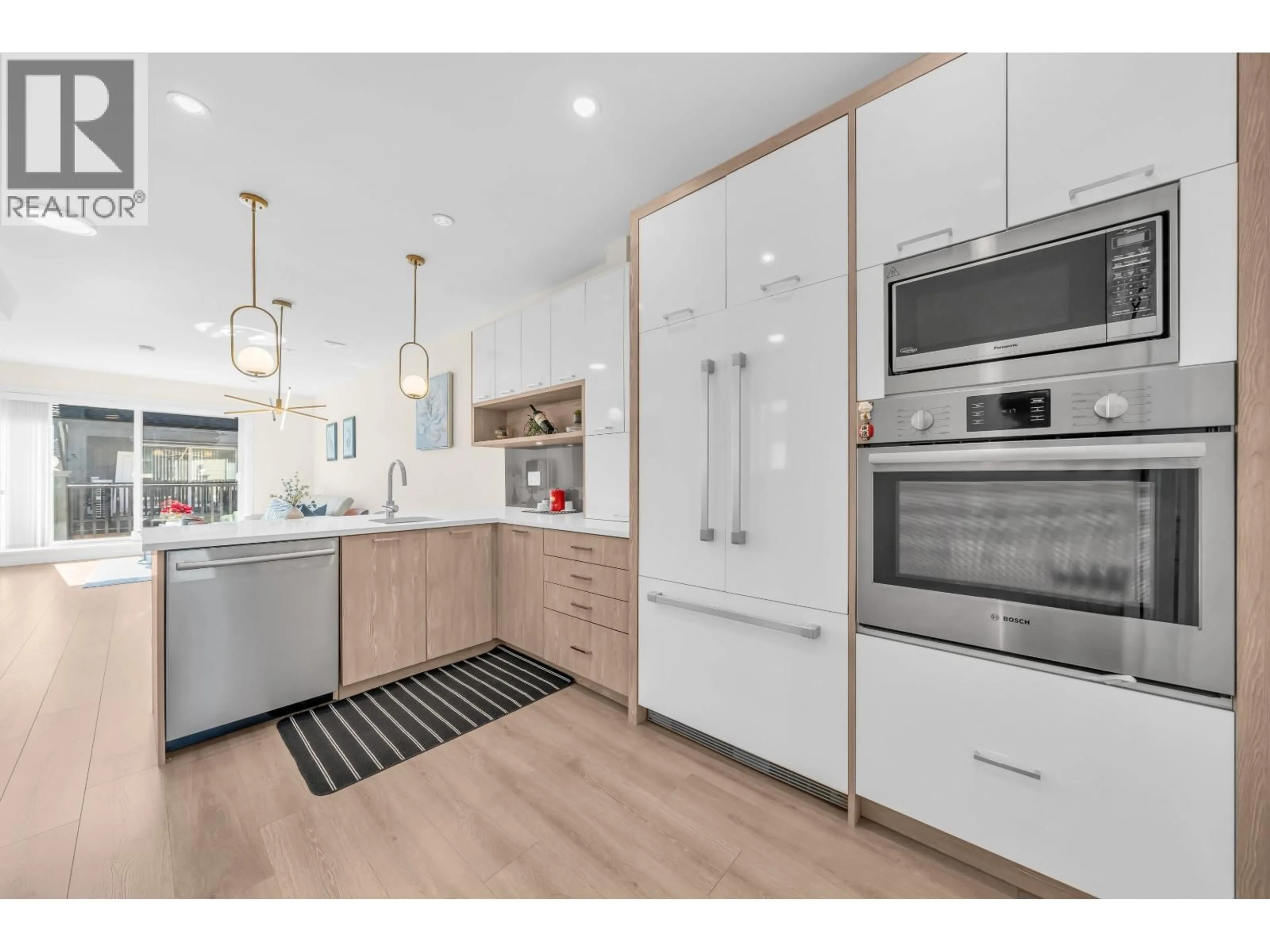 Open concept kitchen, wood/laminate floor for 13 - 9800 GRANVILLE AVENUE, Richmond British Columbia V6Y1R3