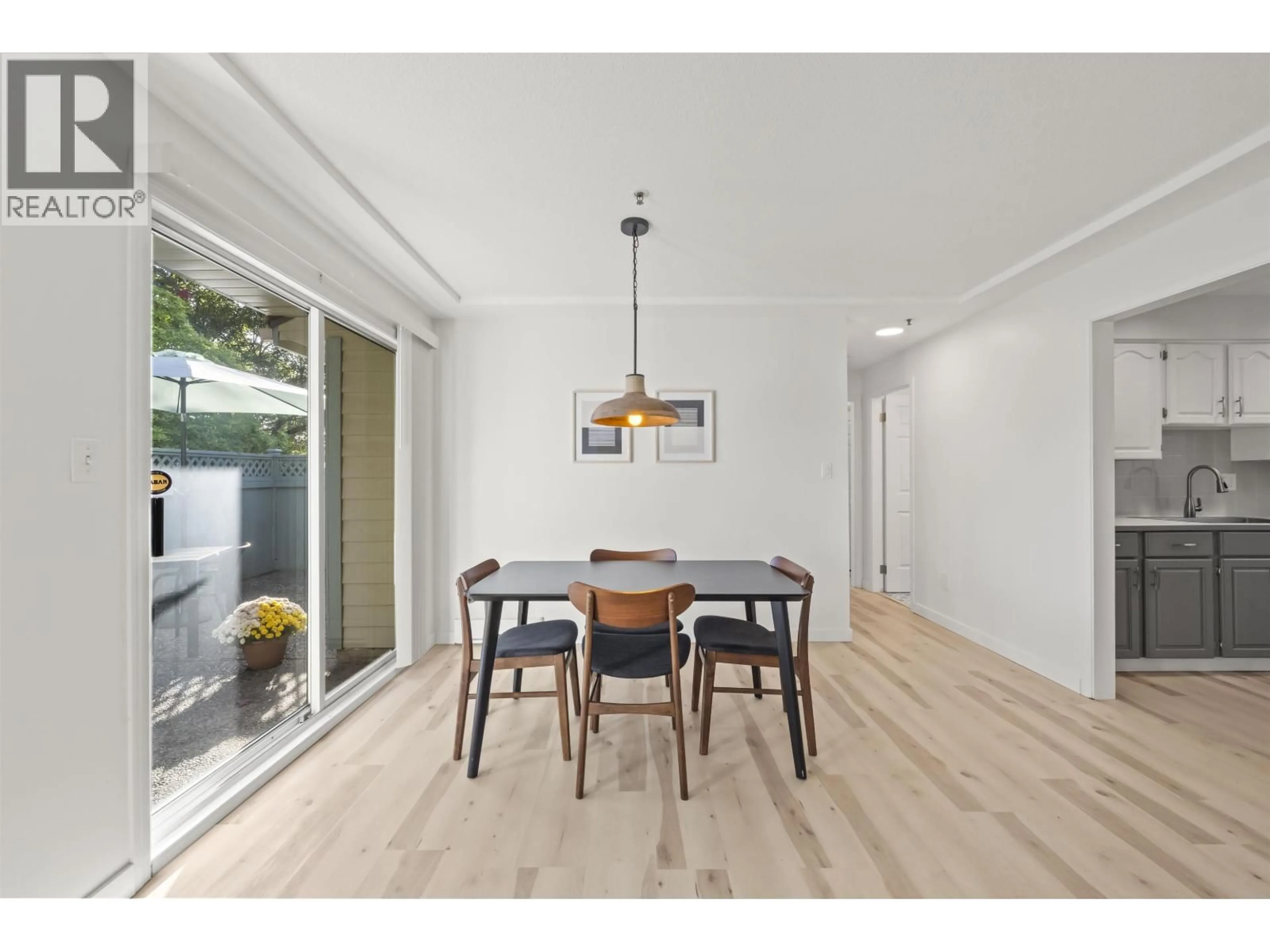 Dining room, wood/laminate floor for 1 - 7110 BARNET ROAD, Burnaby British Columbia V5A4S2