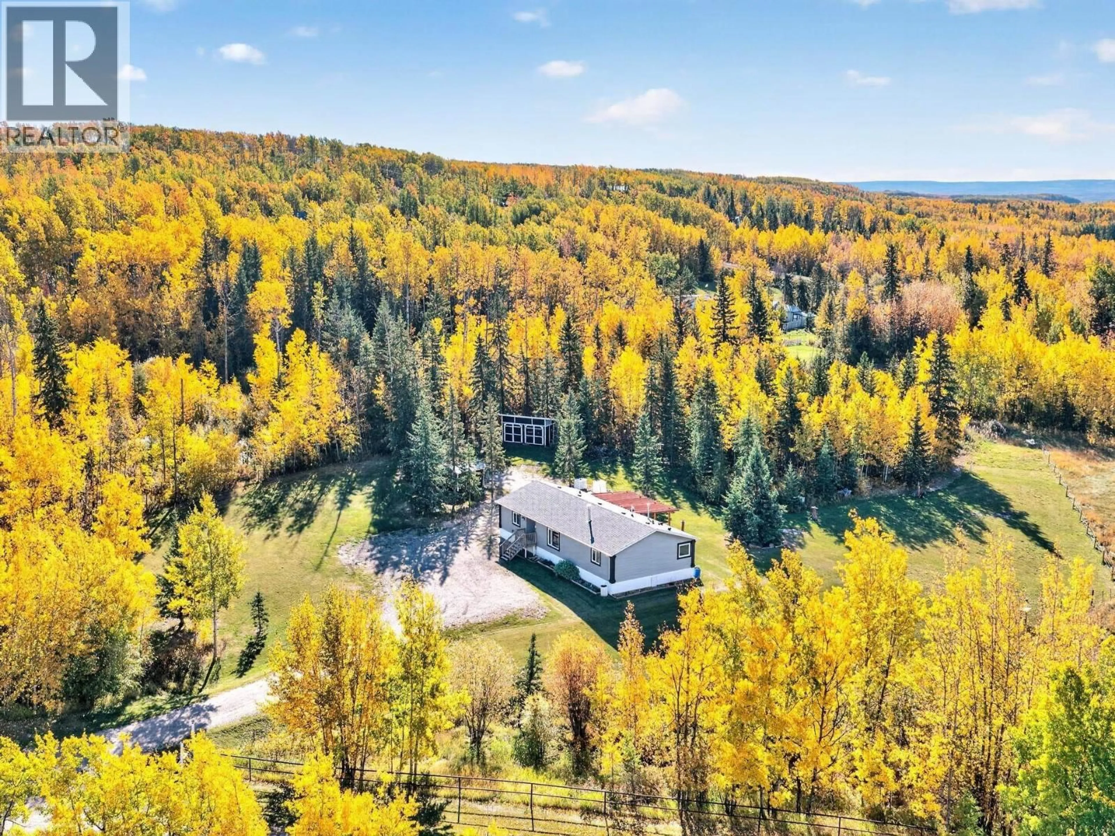 A pic from outside/outdoor area/front of a property/back of a property/a pic from drone, forest/trees view for 13137 WRIGHT ROAD, Charlie Lake British Columbia V0C1H0