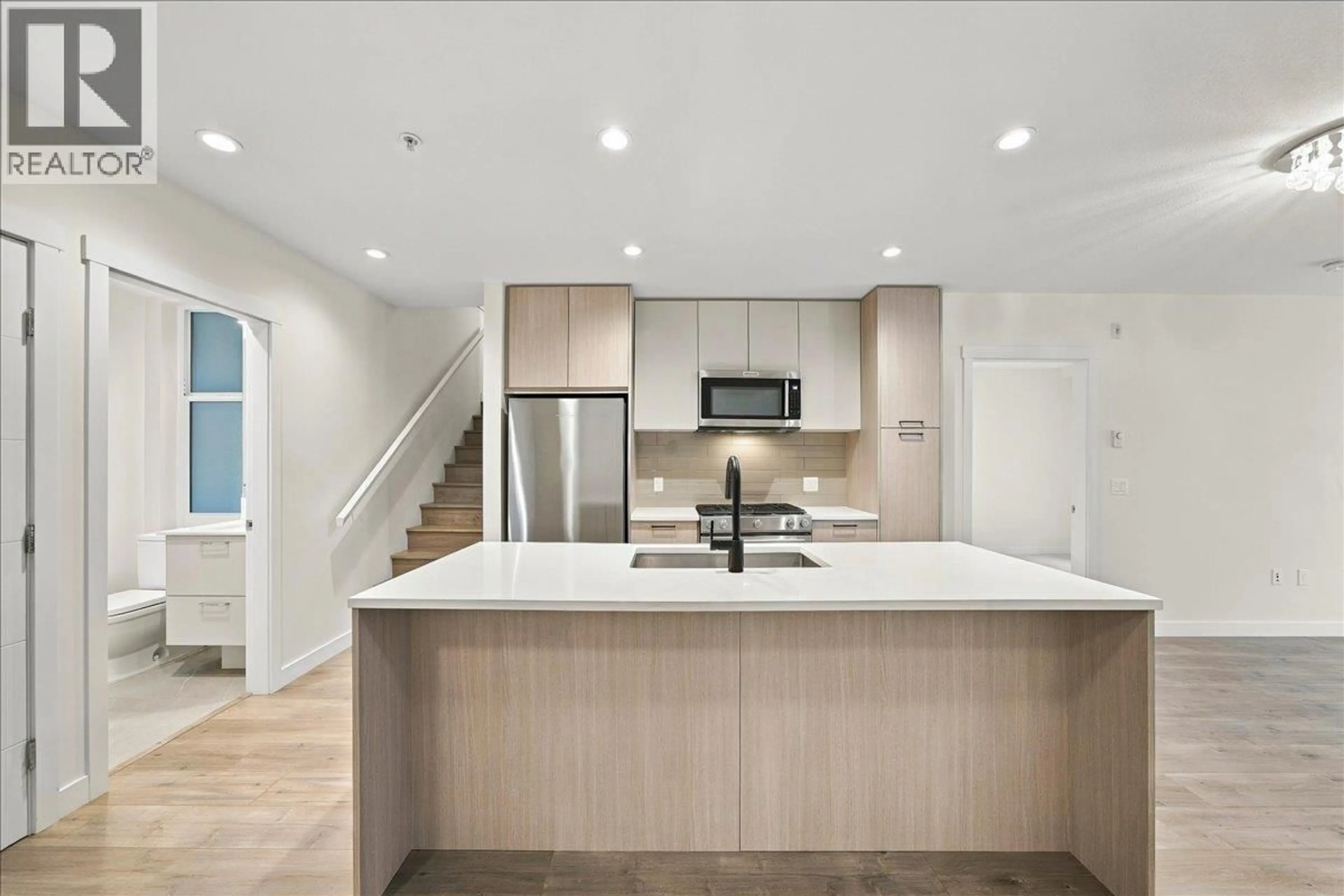 Open concept kitchen, unknown for 604 - 707 COMO LAKE AVENUE, Coquitlam British Columbia V3J0J5