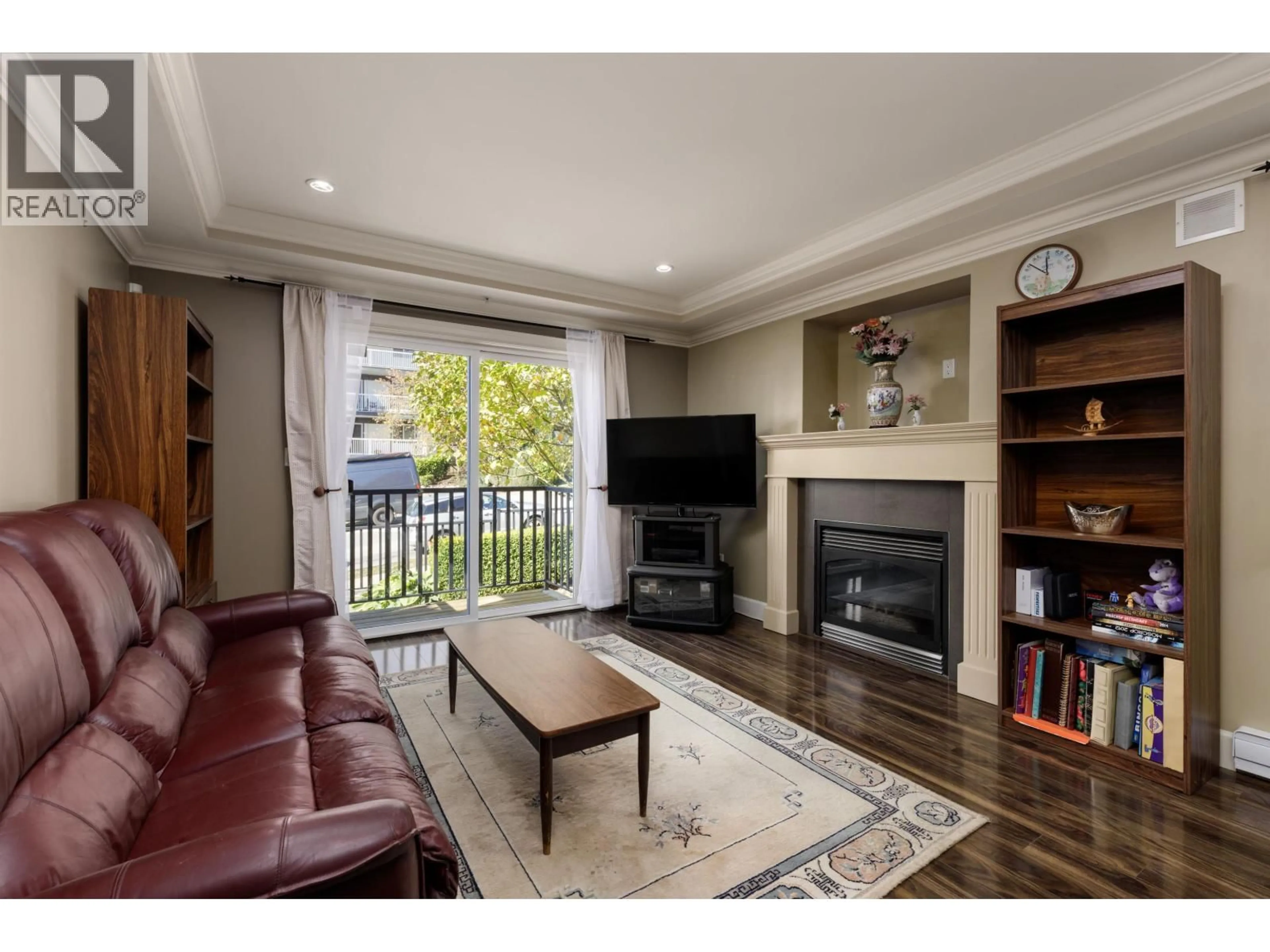 Living room with furniture, wood/laminate floor for 1 - 388 ELLESMERE AVENUE, Burnaby British Columbia V6B3S9