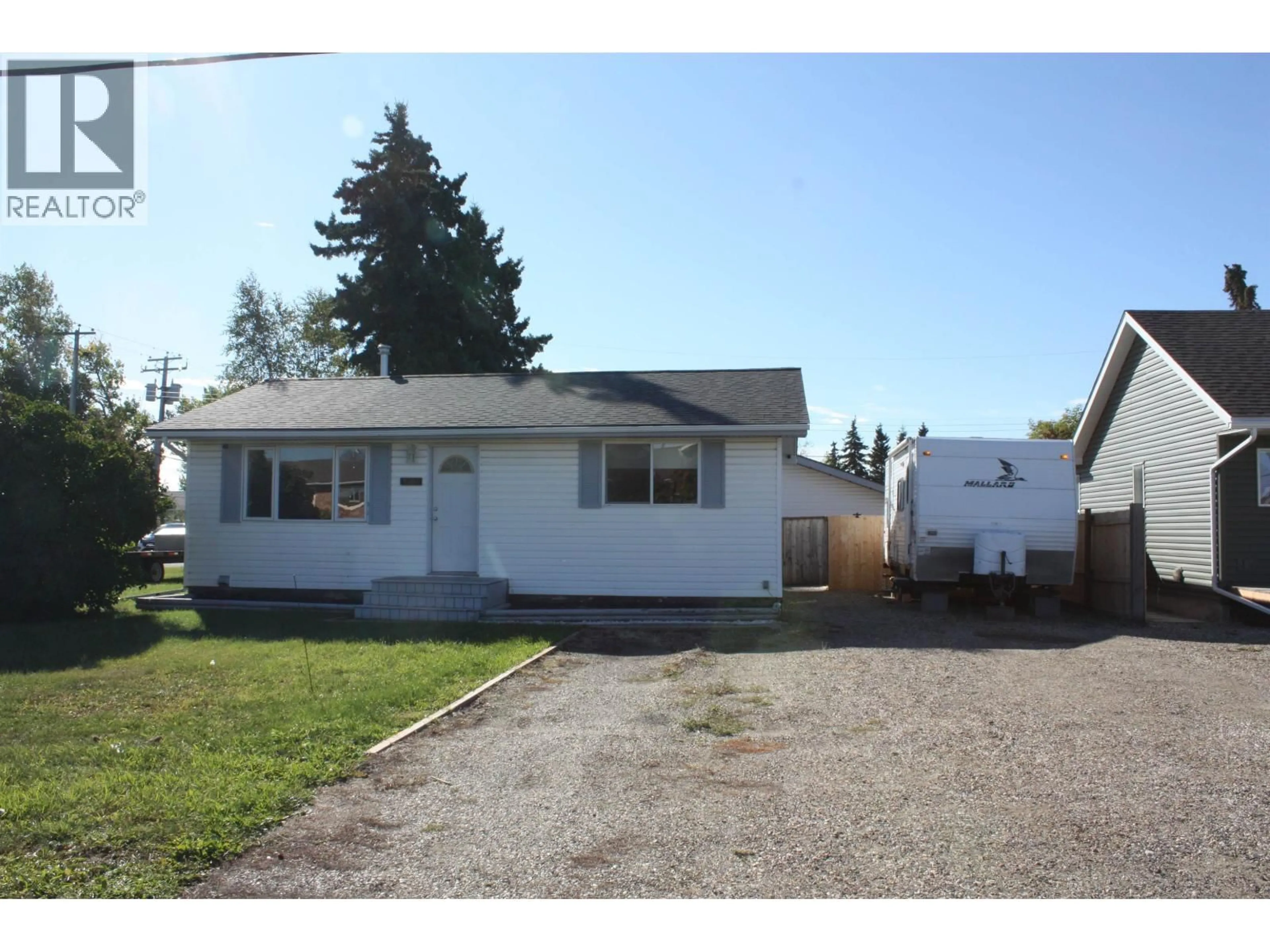 Home with vinyl exterior material, street for 9203 108 AVENUE, Fort St. John British Columbia V1J2P7