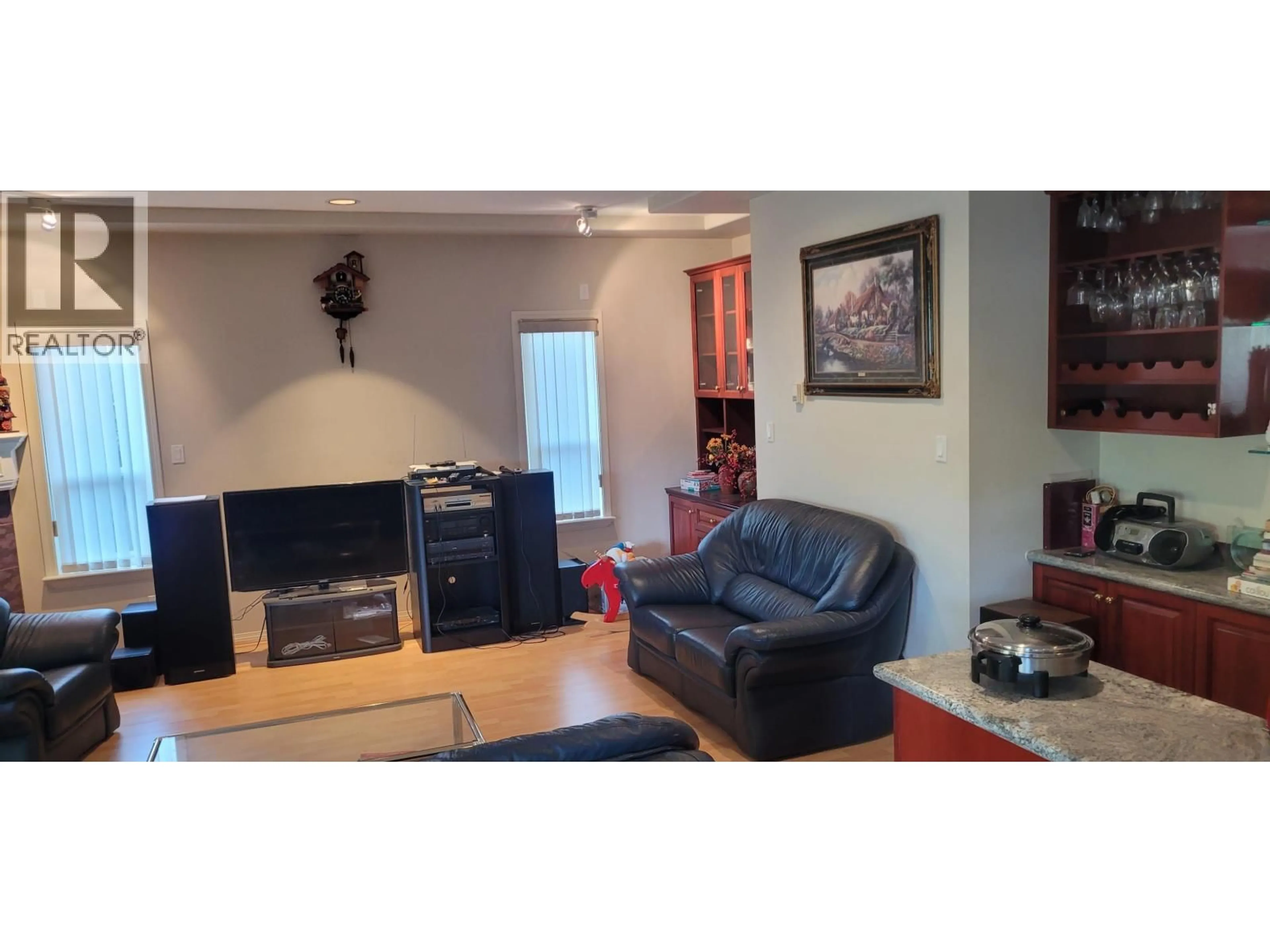 Living room with furniture, wood/laminate floor for 6571 MANG ROAD, Richmond British Columbia V7C2Y1