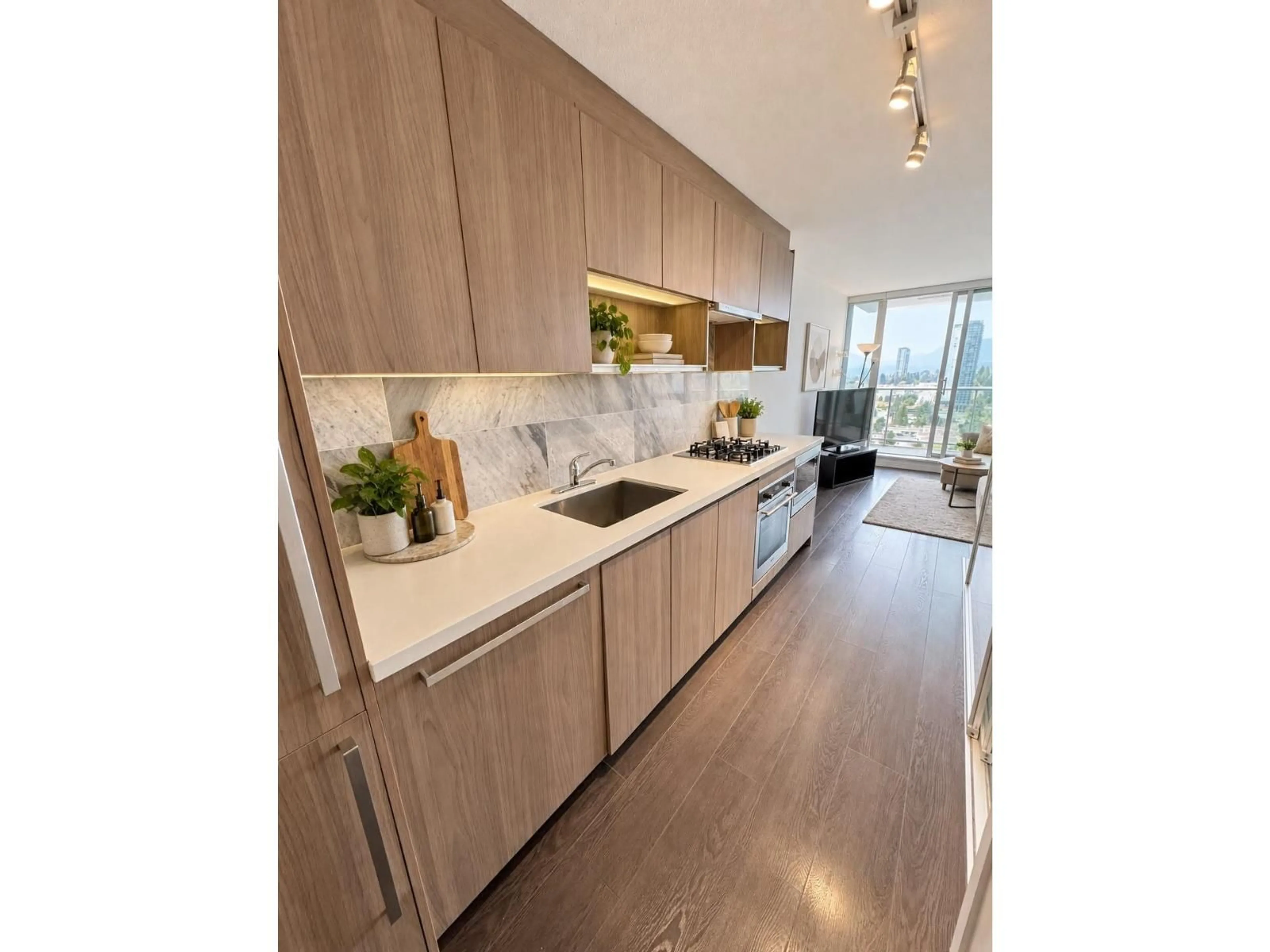 Open concept kitchen, wood/laminate floor for 2510 - 13750 100 AVENUE, Surrey British Columbia V3T0L3