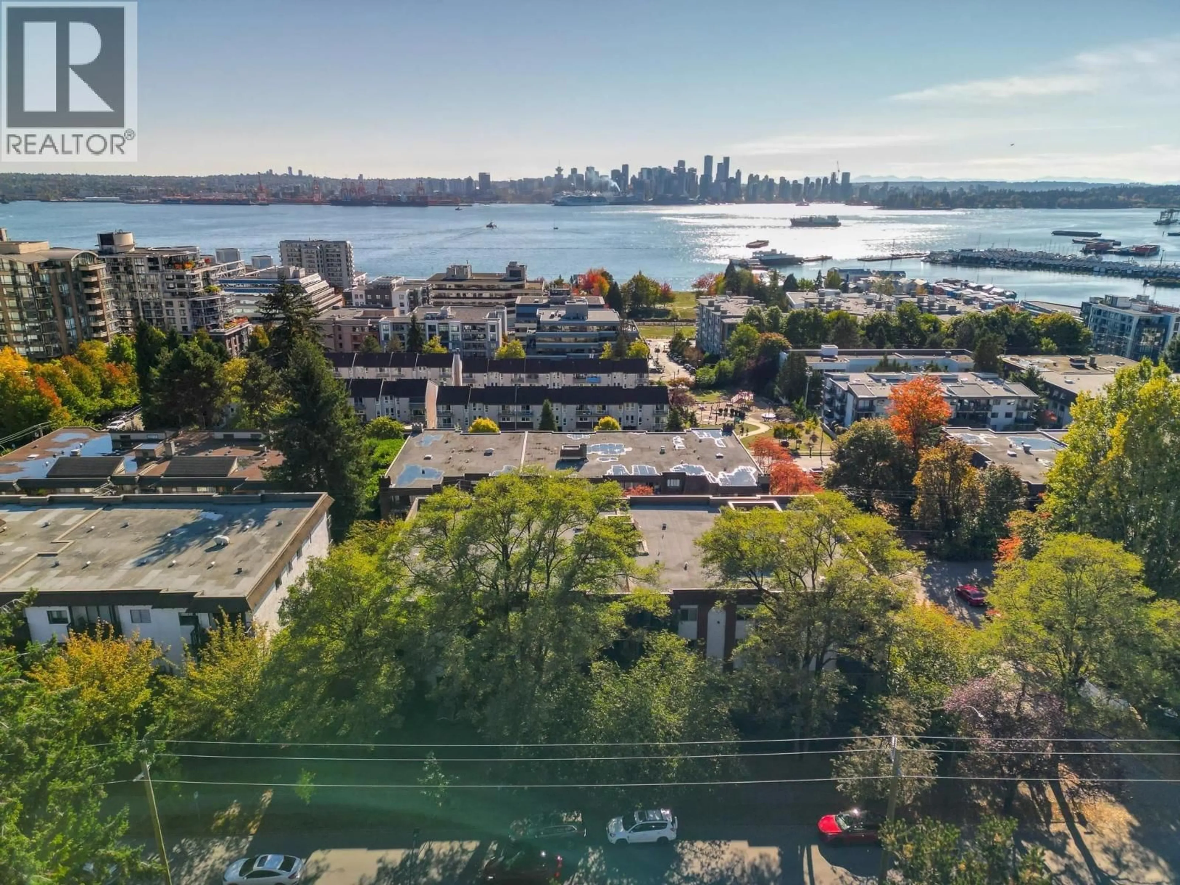 A pic from outside/outdoor area/front of a property/back of a property/a pic from drone, water/lake/river/ocean view for 201 - 225 3RD STREET, North Vancouver British Columbia V7M1E9
