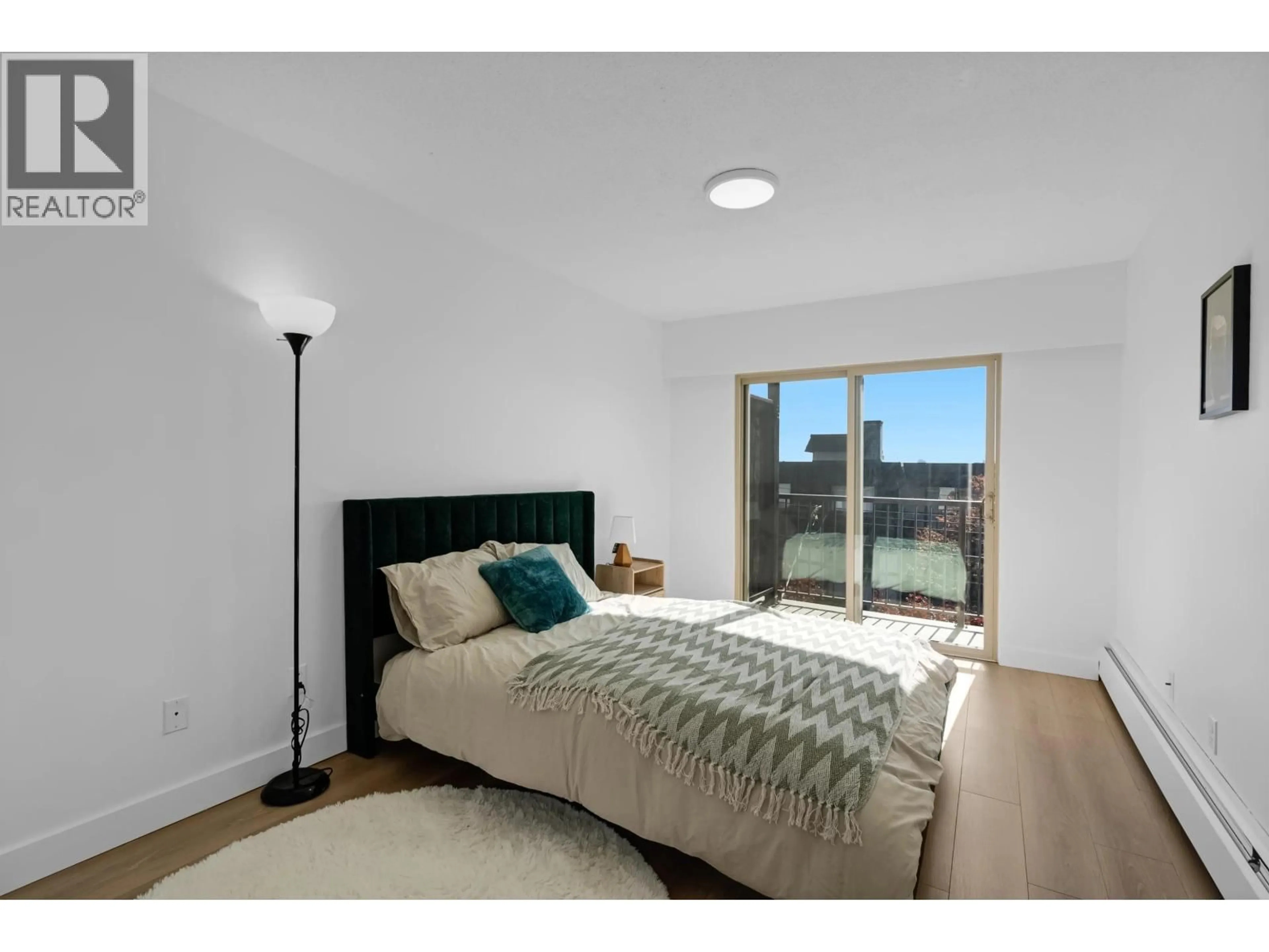 Bedroom with bed, unknown for 201 - 225 3RD STREET, North Vancouver British Columbia V7M1E9