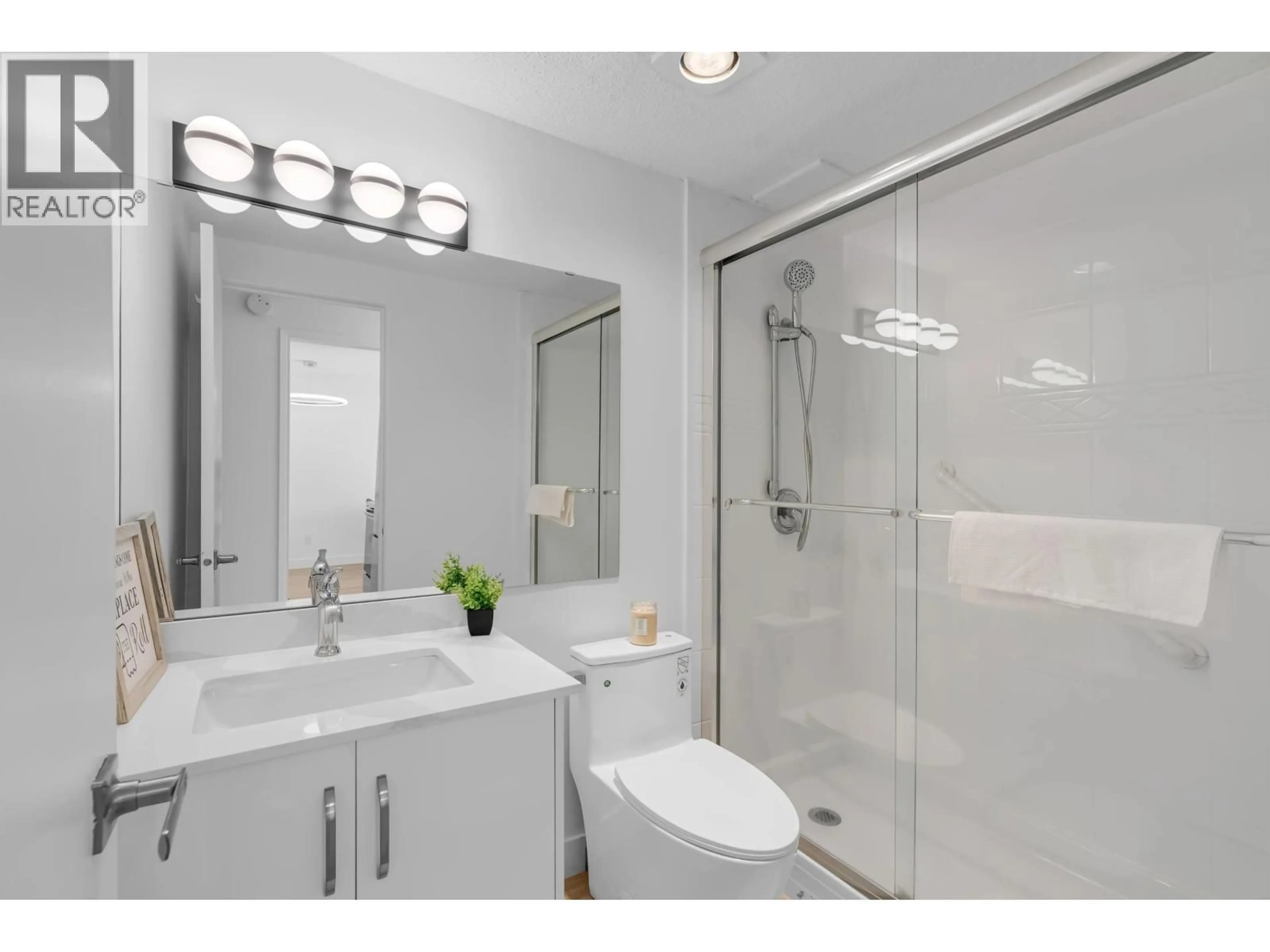 Standard bathroom, ceramic/tile floor for 201 - 225 3RD STREET, North Vancouver British Columbia V7M1E9