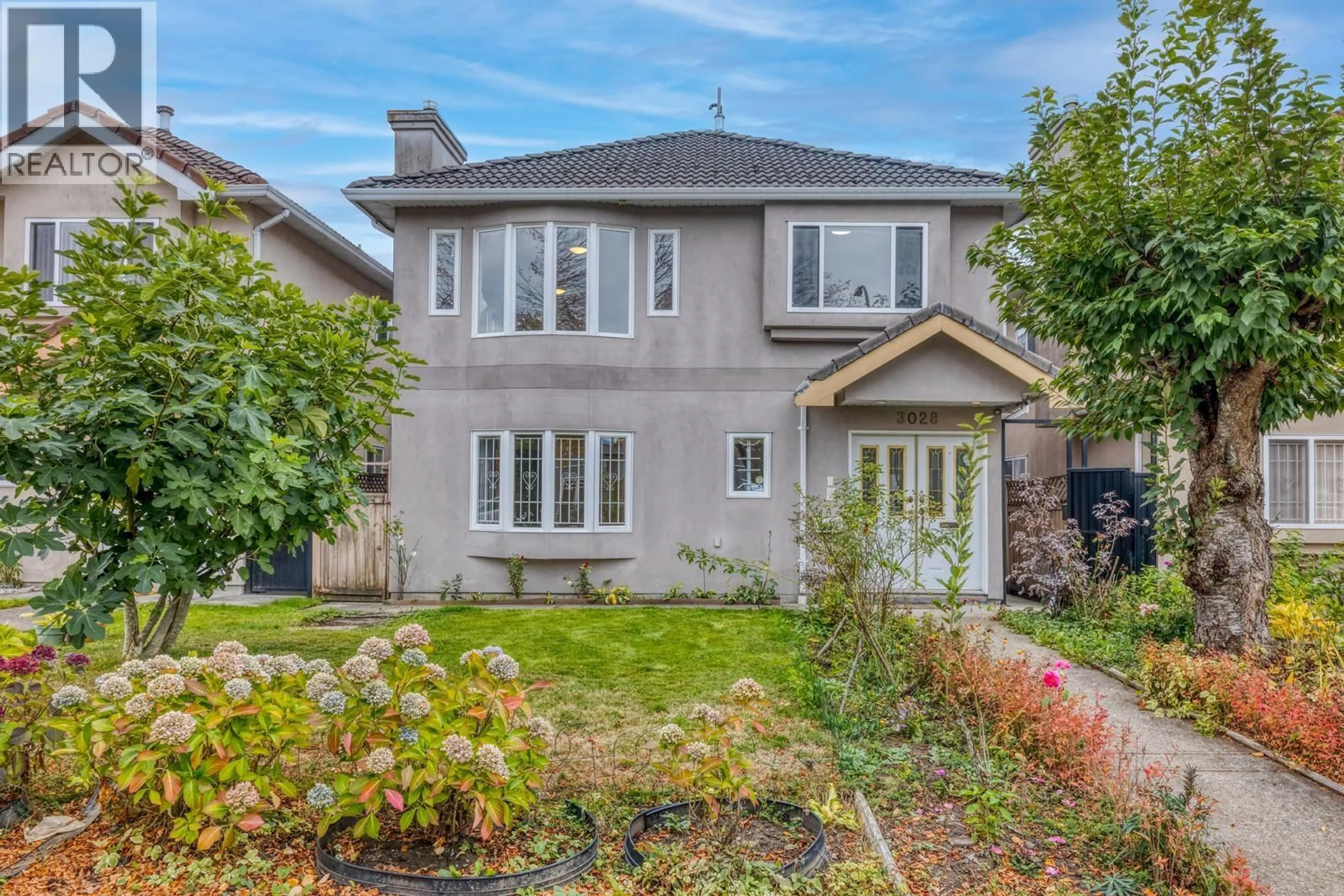 Home with vinyl exterior material, street for 3028 26TH AVENUE, Vancouver British Columbia V5R1L6