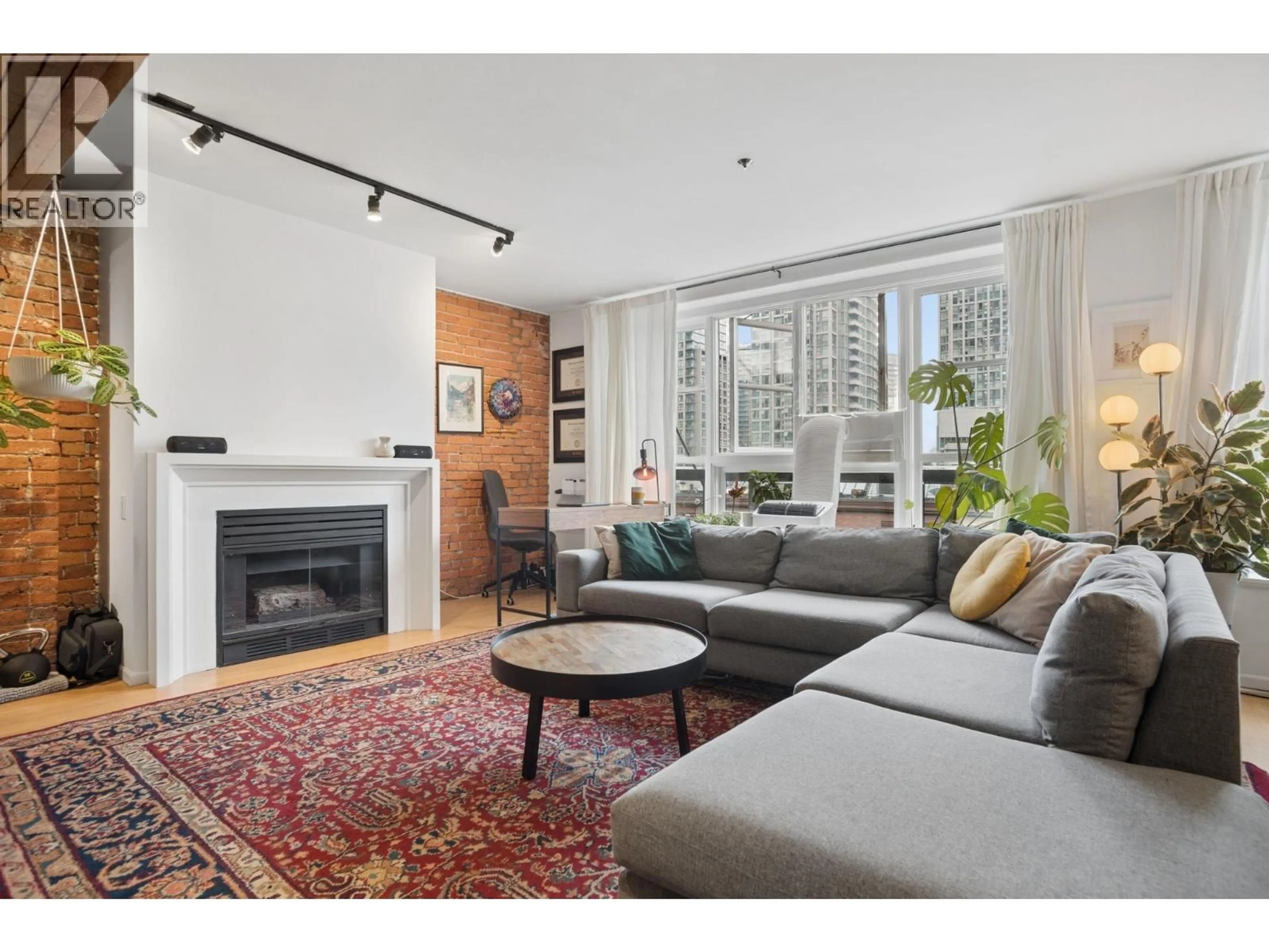 Living room with furniture, unknown for 305 - 1066 HAMILTON STREET, Vancouver British Columbia V6B2R9