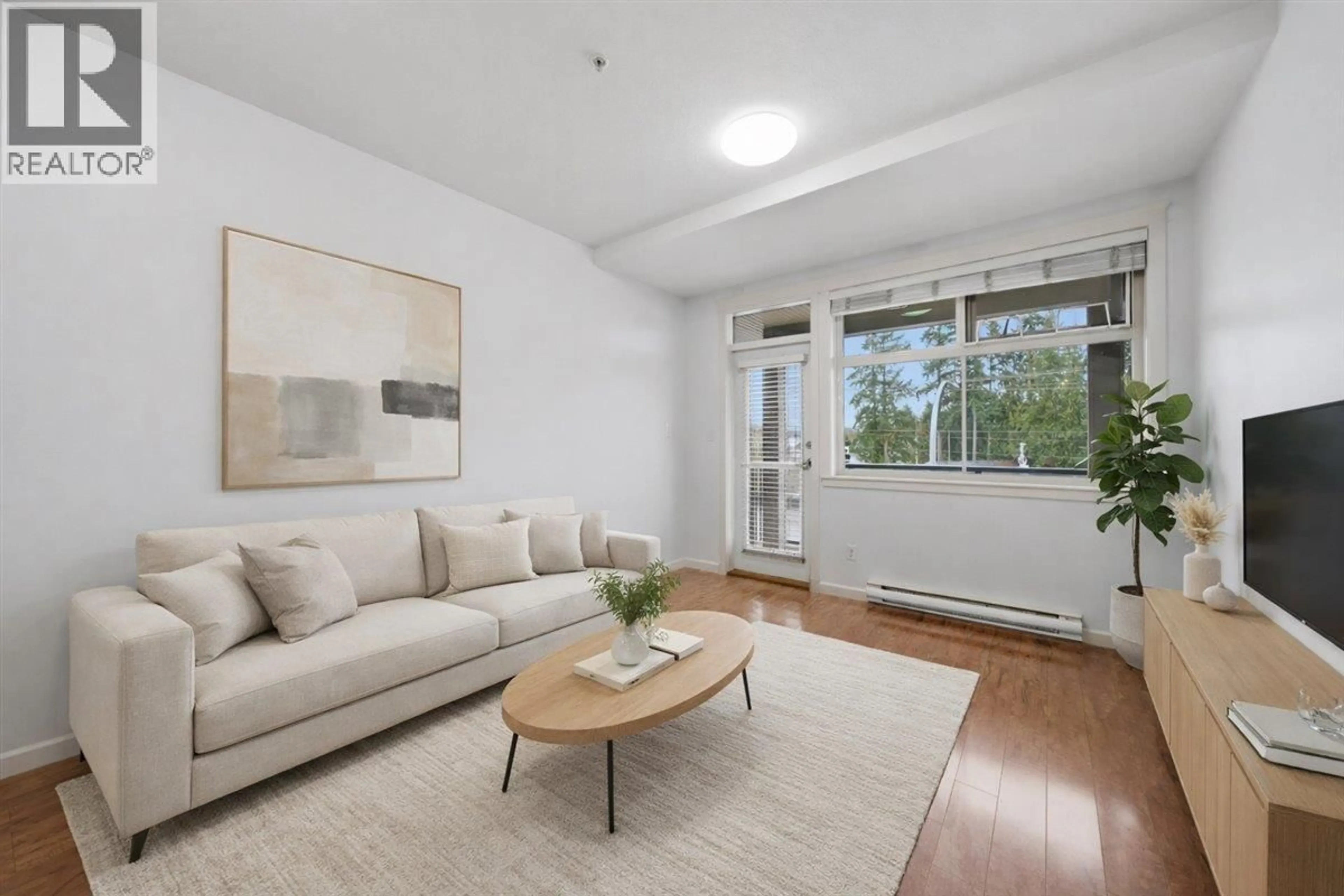 Living room with furniture, unknown for 307 - 22858 LOUGHEED HIGHWAY, Maple Ridge British Columbia V2X2V6