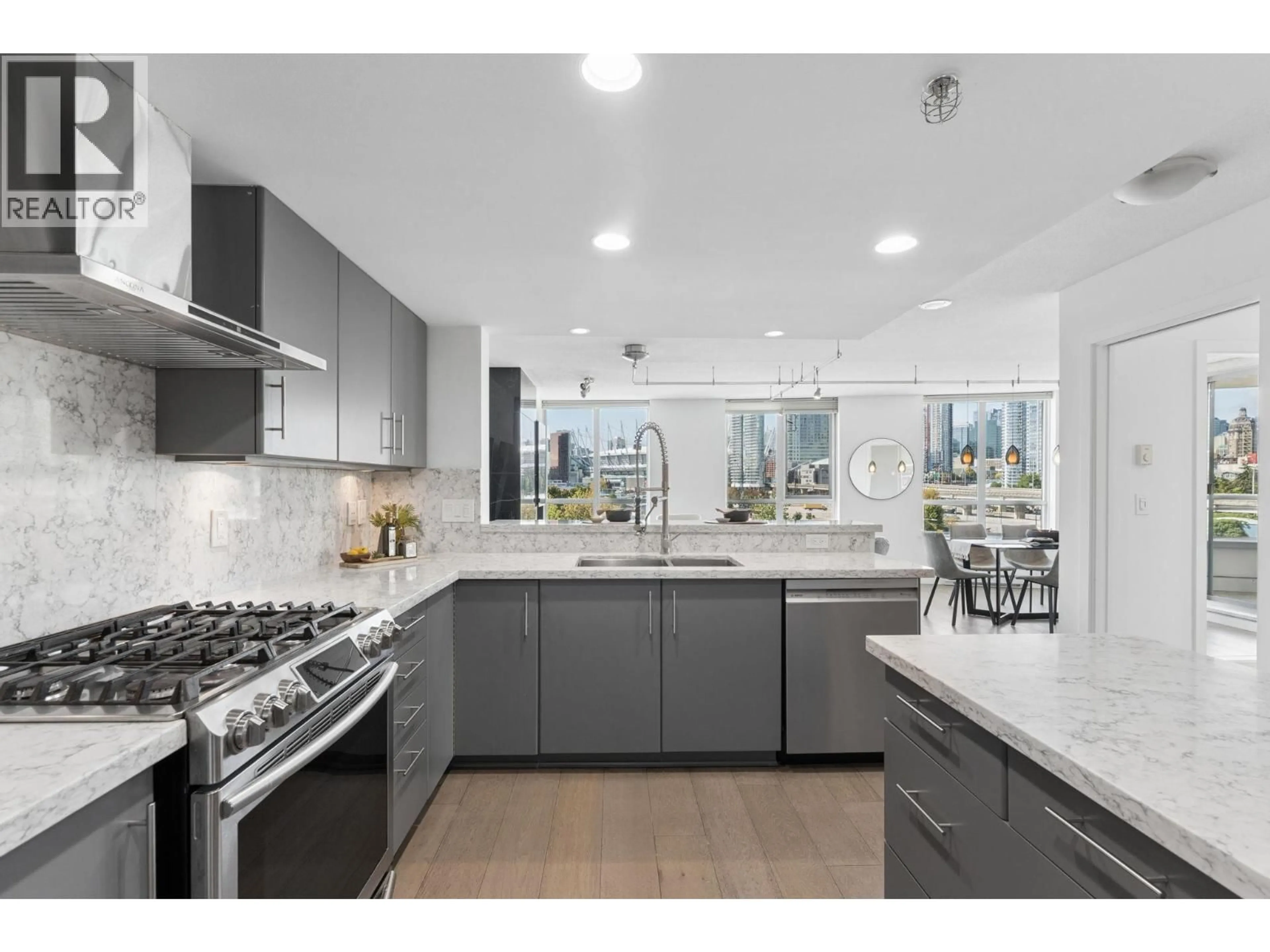 Open concept kitchen, ceramic/tile floor for 506 - 120 MILROSS AVENUE, Vancouver British Columbia V6A4K7