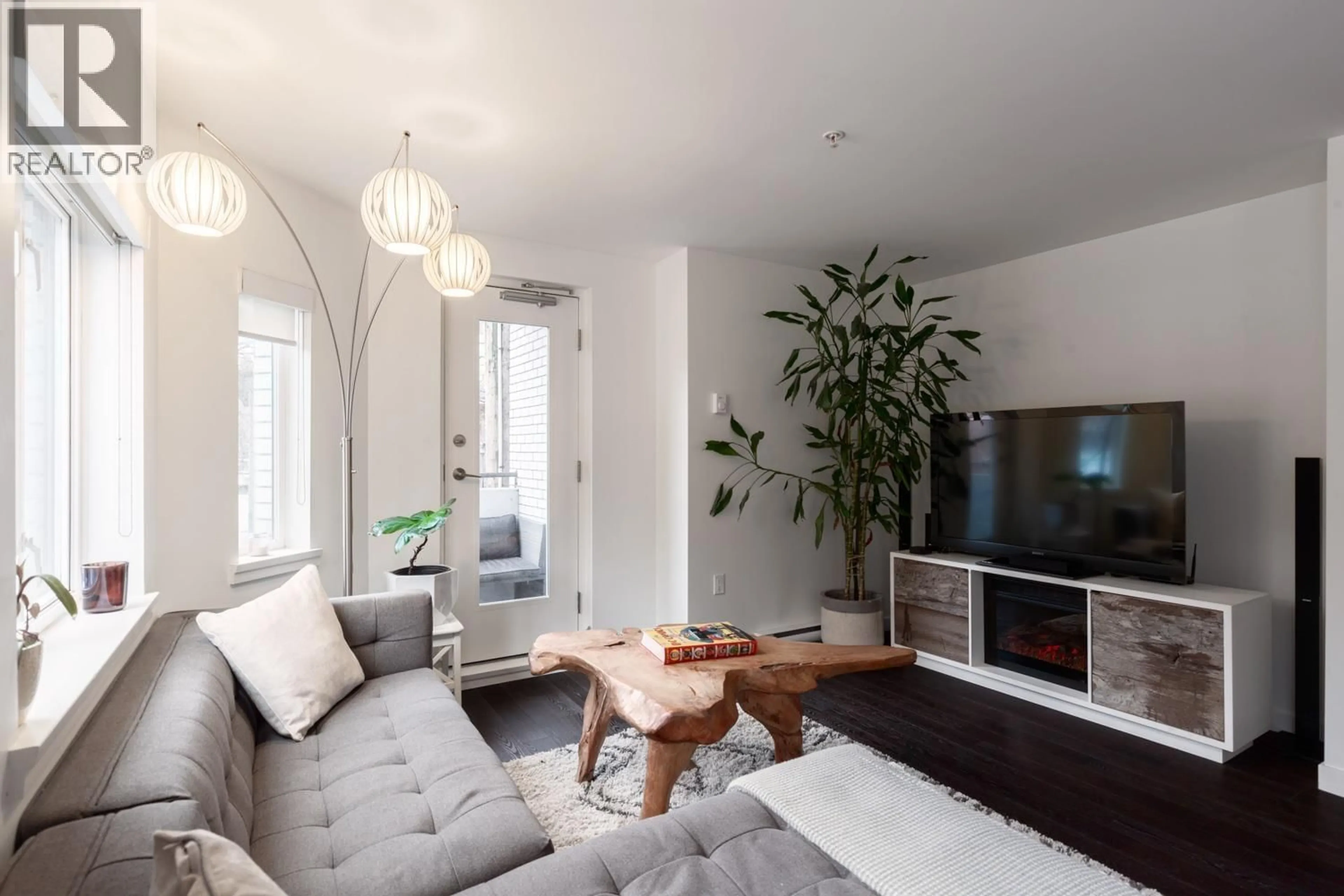 Living room with furniture, unknown for 203 - 370 CARRALL STREET, Vancouver British Columbia V6B2J3
