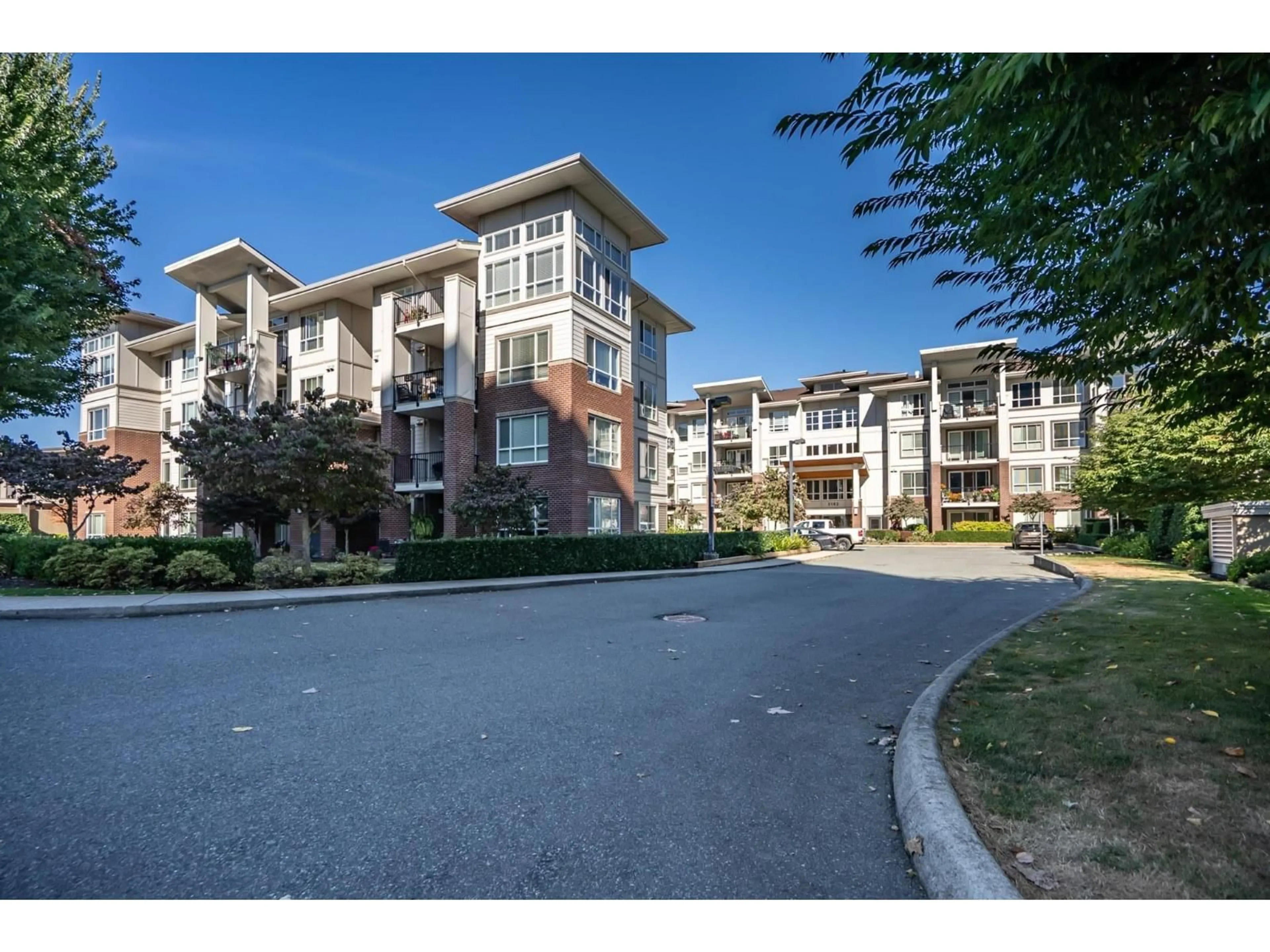 A pic from outside/outdoor area/front of a property/back of a property/a pic from drone, unknown for 403 - 3192 GLADWIN ROAD, Abbotsford British Columbia V2T6M9