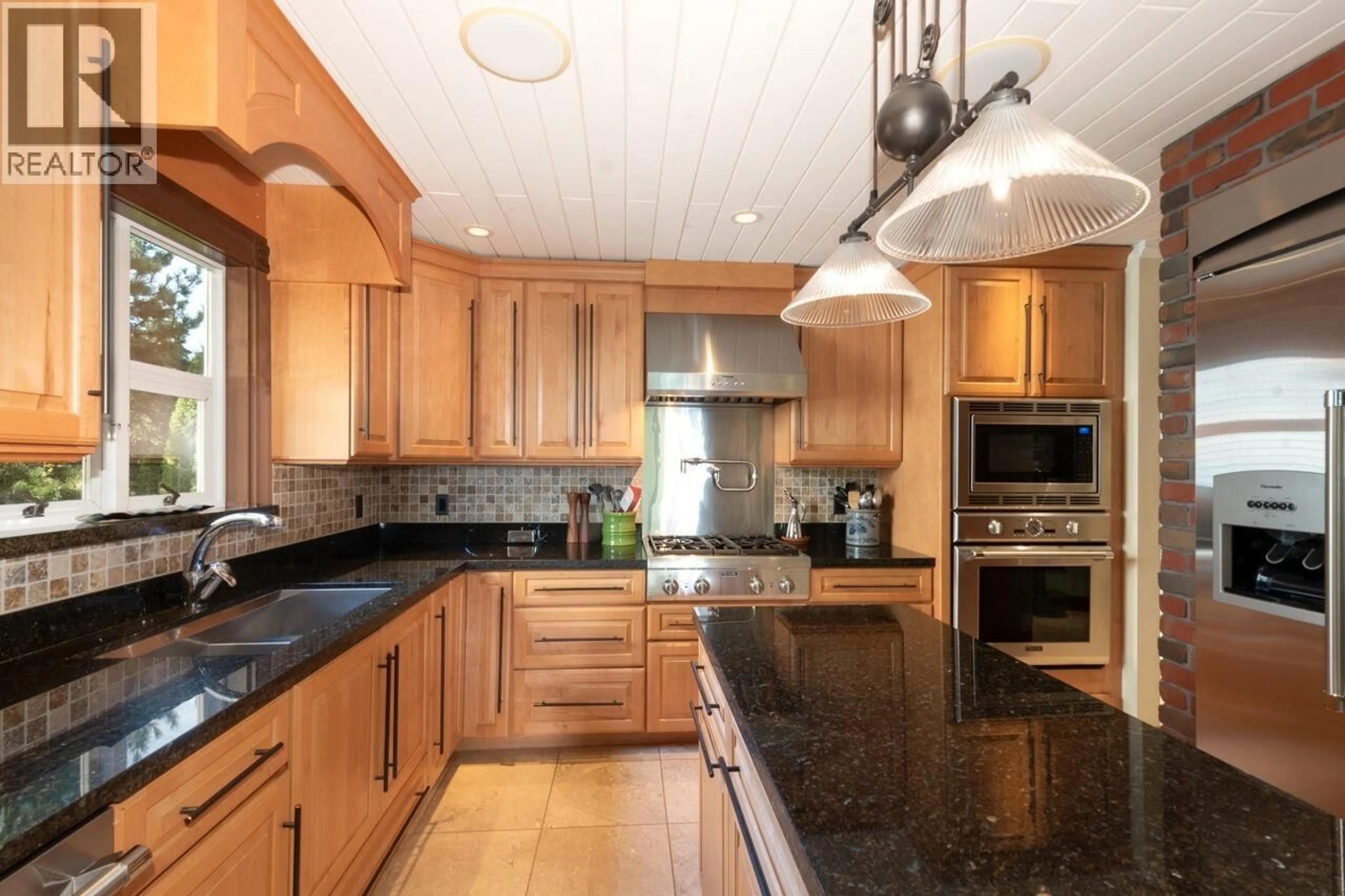 Contemporary kitchen, ceramic/tile floor for 39 - 3939 INDIAN RIVER DRIVE, North Vancouver British Columbia V7G2P6