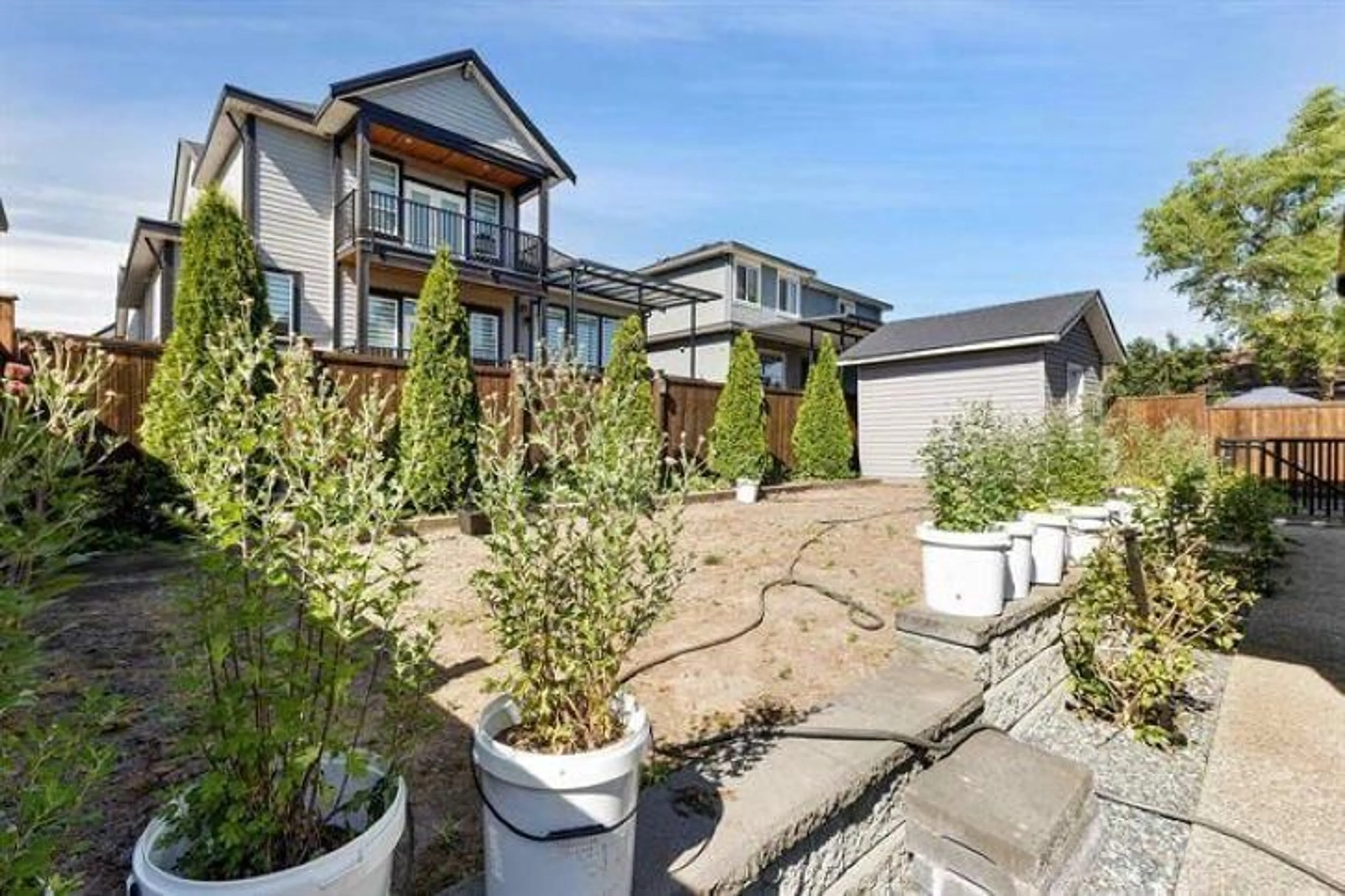 A pic from outside/outdoor area/front of a property/back of a property/a pic from drone, street for 18585 56 AVENUE, Surrey British Columbia V3S9E5
