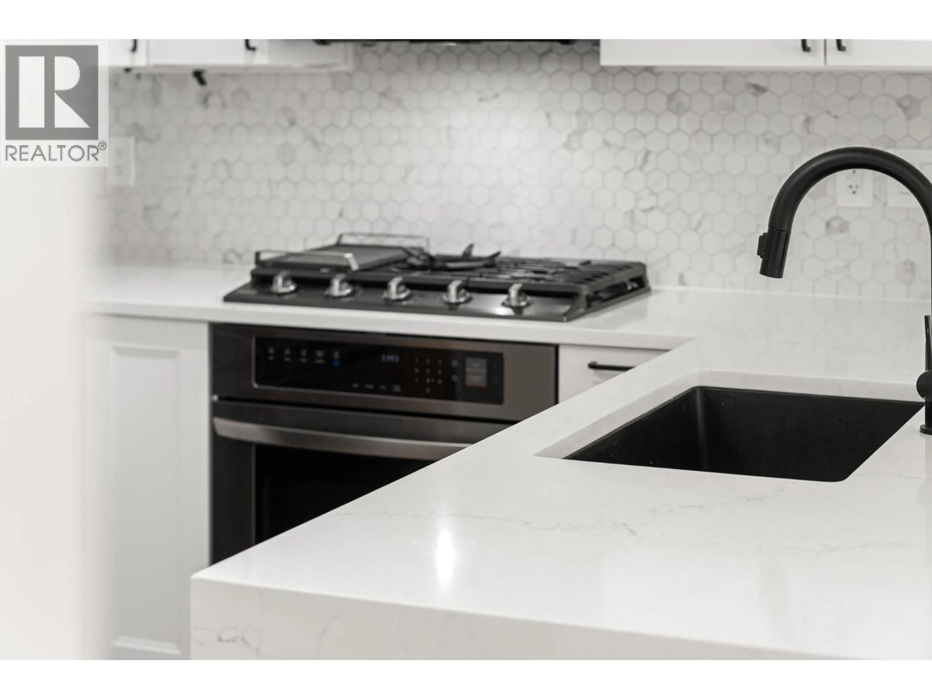 Contemporary kitchen, ceramic/tile floor for 417 - 119 22ND STREET, North Vancouver British Columbia V7M0B4