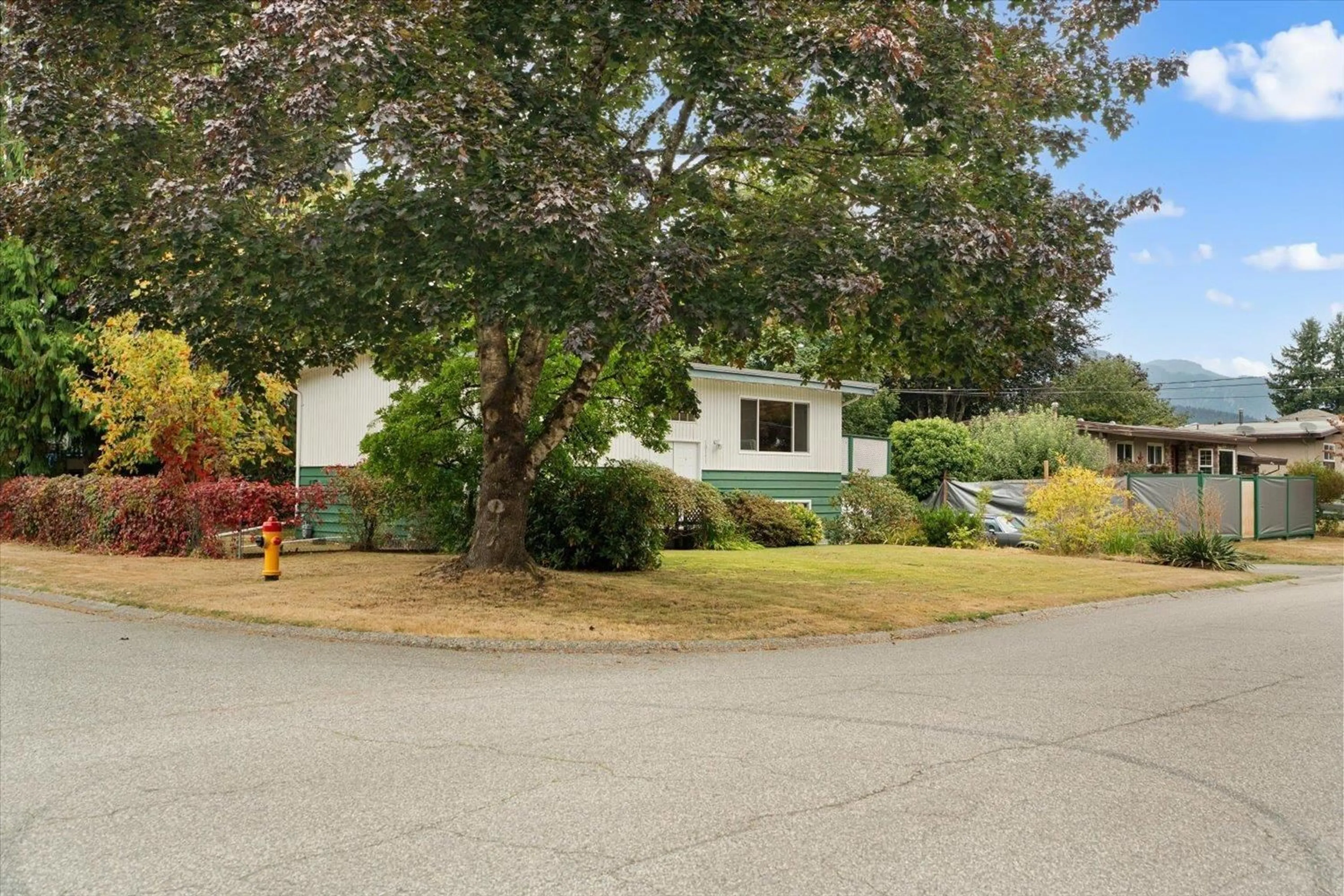 A pic from outside/outdoor area/front of a property/back of a property/a pic from drone, street for 10151 WEDGEWOOD DRIVE, Chilliwack British Columbia V2P6C1