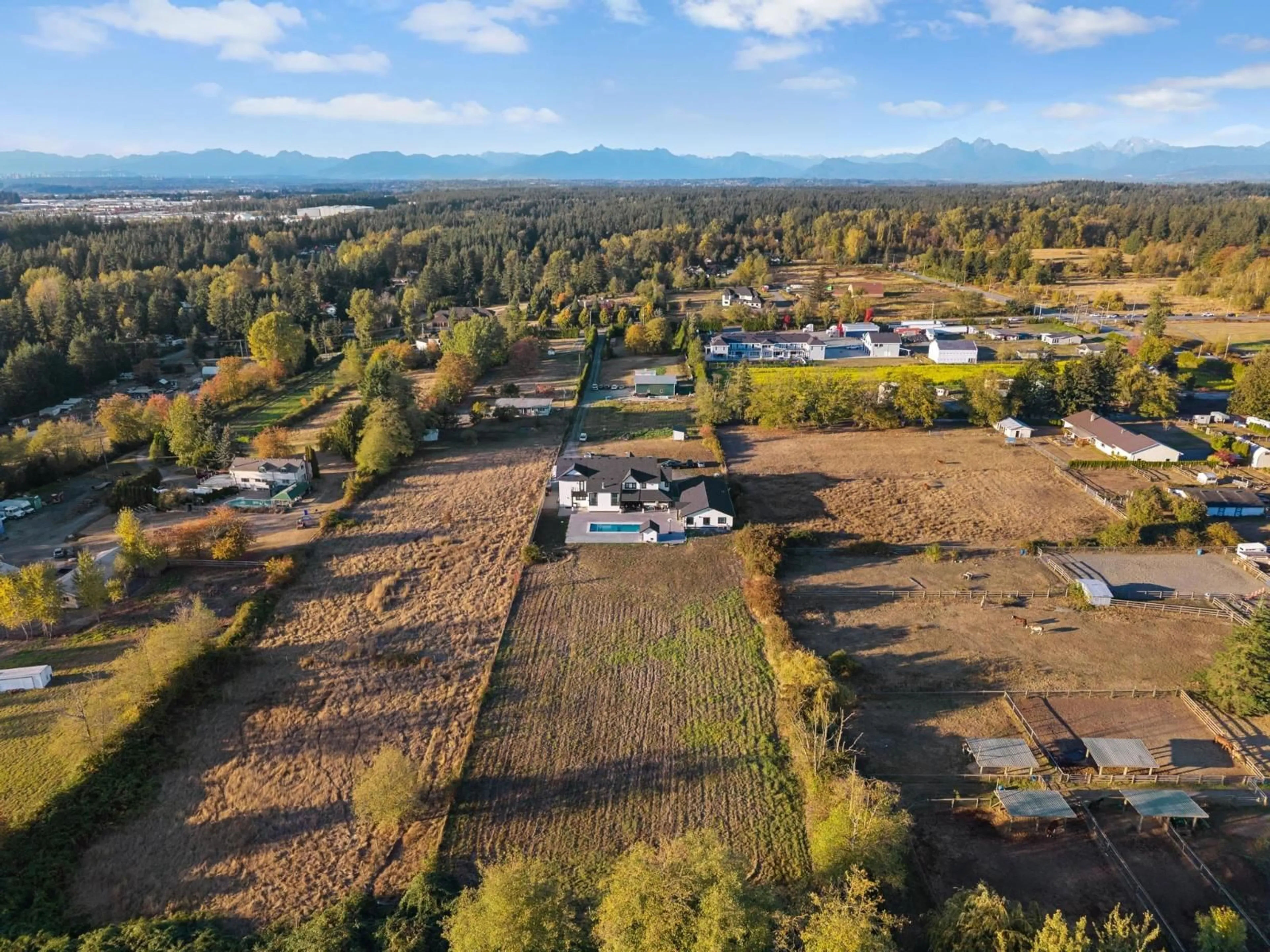 A pic from outside/outdoor area/front of a property/back of a property/a pic from drone, mountain view for 19890 16 AVENUE, Langley British Columbia V2Z1K1