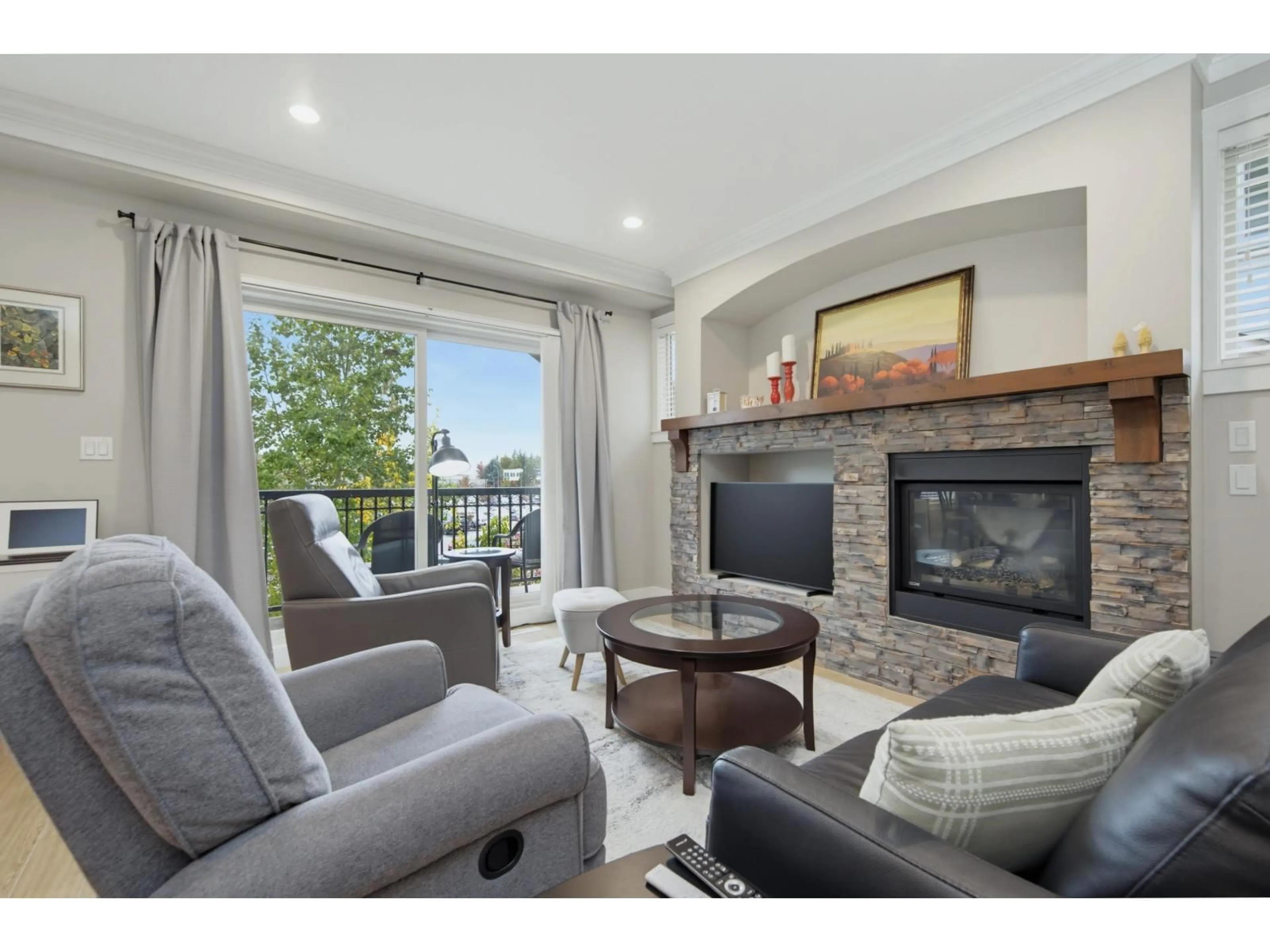 Living room with furniture, wood/laminate floor for 62 - 22225 50 AVENUE, Langley British Columbia V2Y0G7
