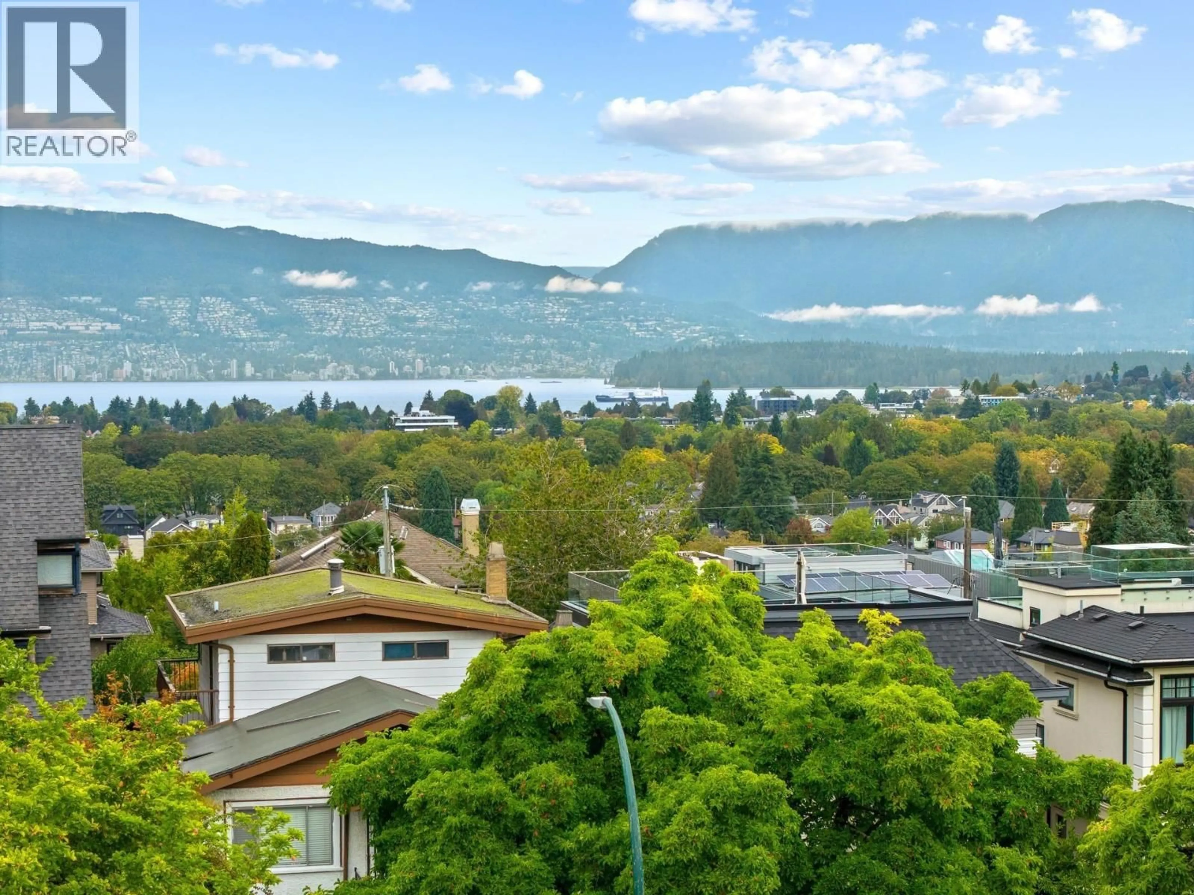 A pic from outside/outdoor area/front of a property/back of a property/a pic from drone, mountain view for 3276 W 21ST AVENUE, Vancouver British Columbia V6L1L2
