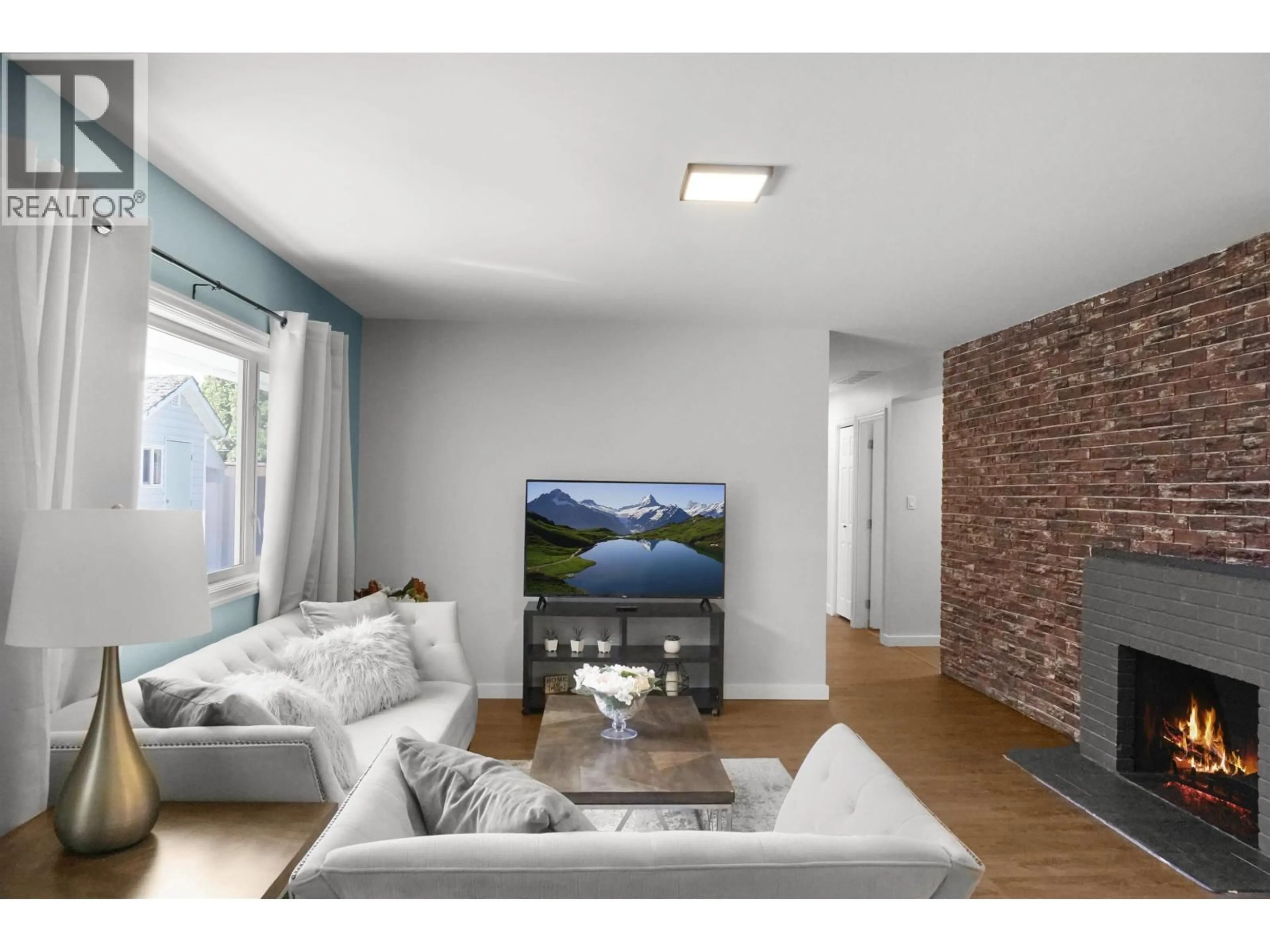 Living room with furniture, wood/laminate floor for 10 SKEENA STREET, Kitimat British Columbia V8C1Y9