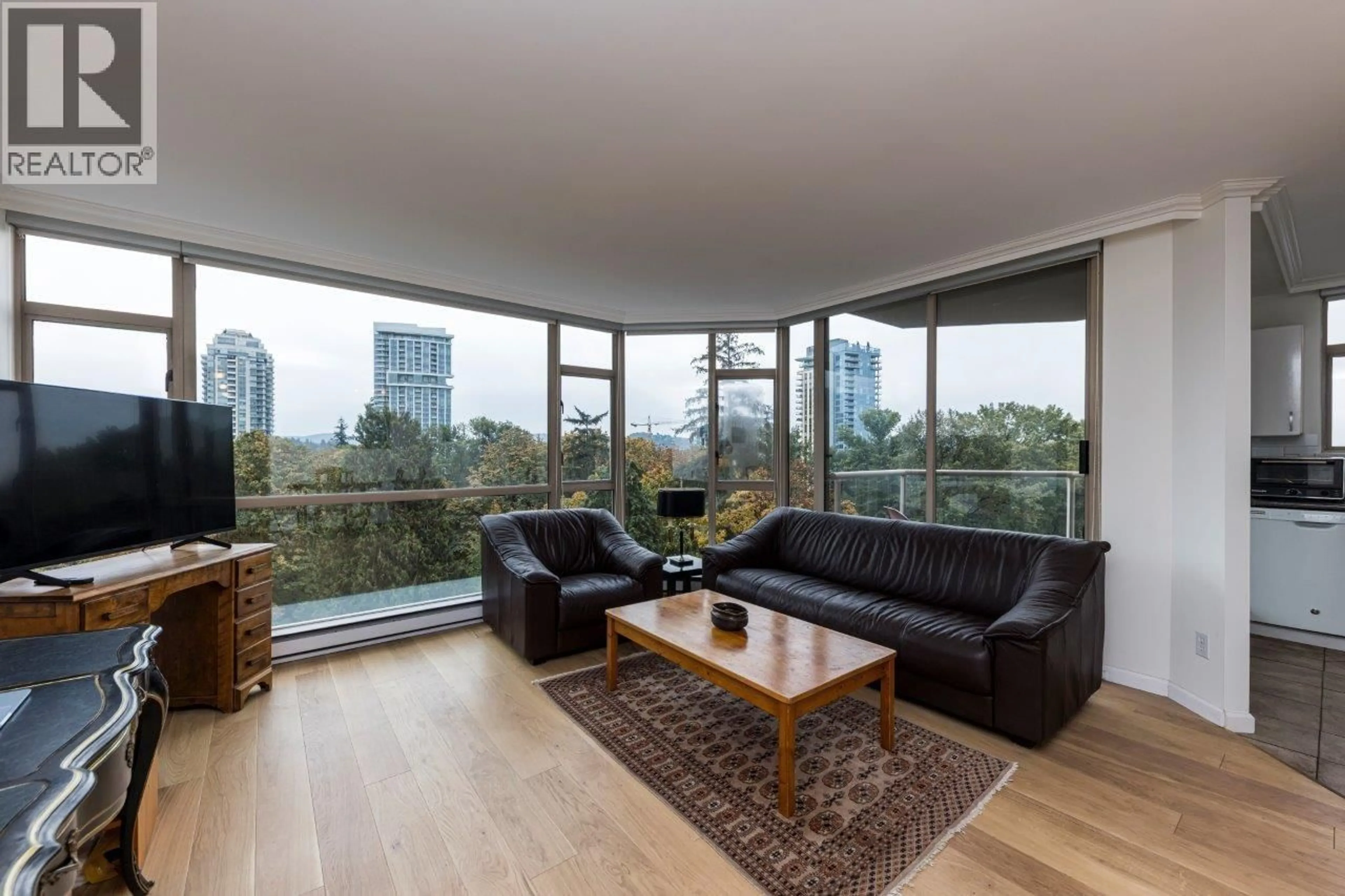 Living room with furniture, wood/laminate floor for 1213 - 1327 KEITH ROAD, North Vancouver British Columbia V7J3T5