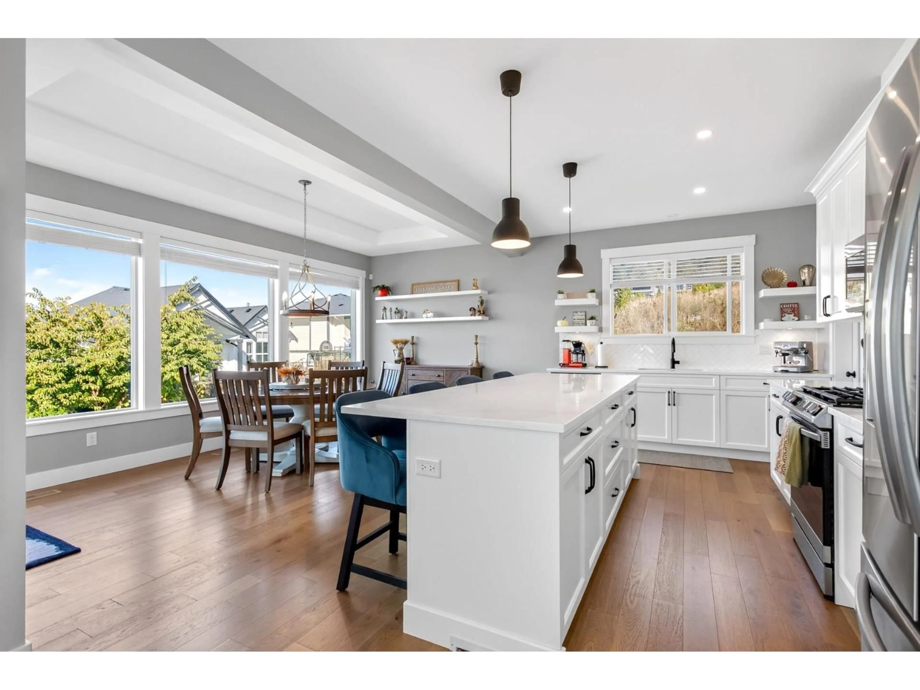 Open concept kitchen, wood/laminate floor for 51067 COLERAINE AVENUE, Chilliwack British Columbia V4Z0C1