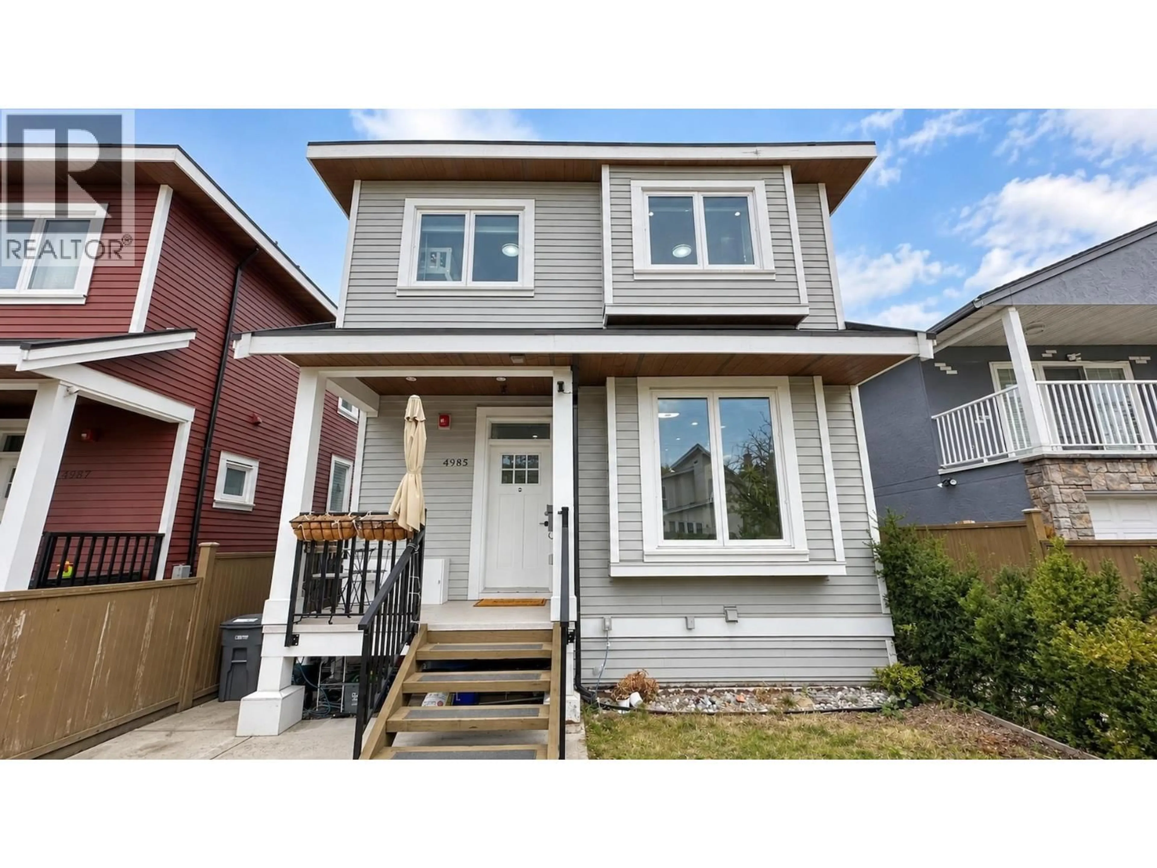 Home with vinyl exterior material, street for 4985 MOSS STREET, Vancouver British Columbia V5R3T5