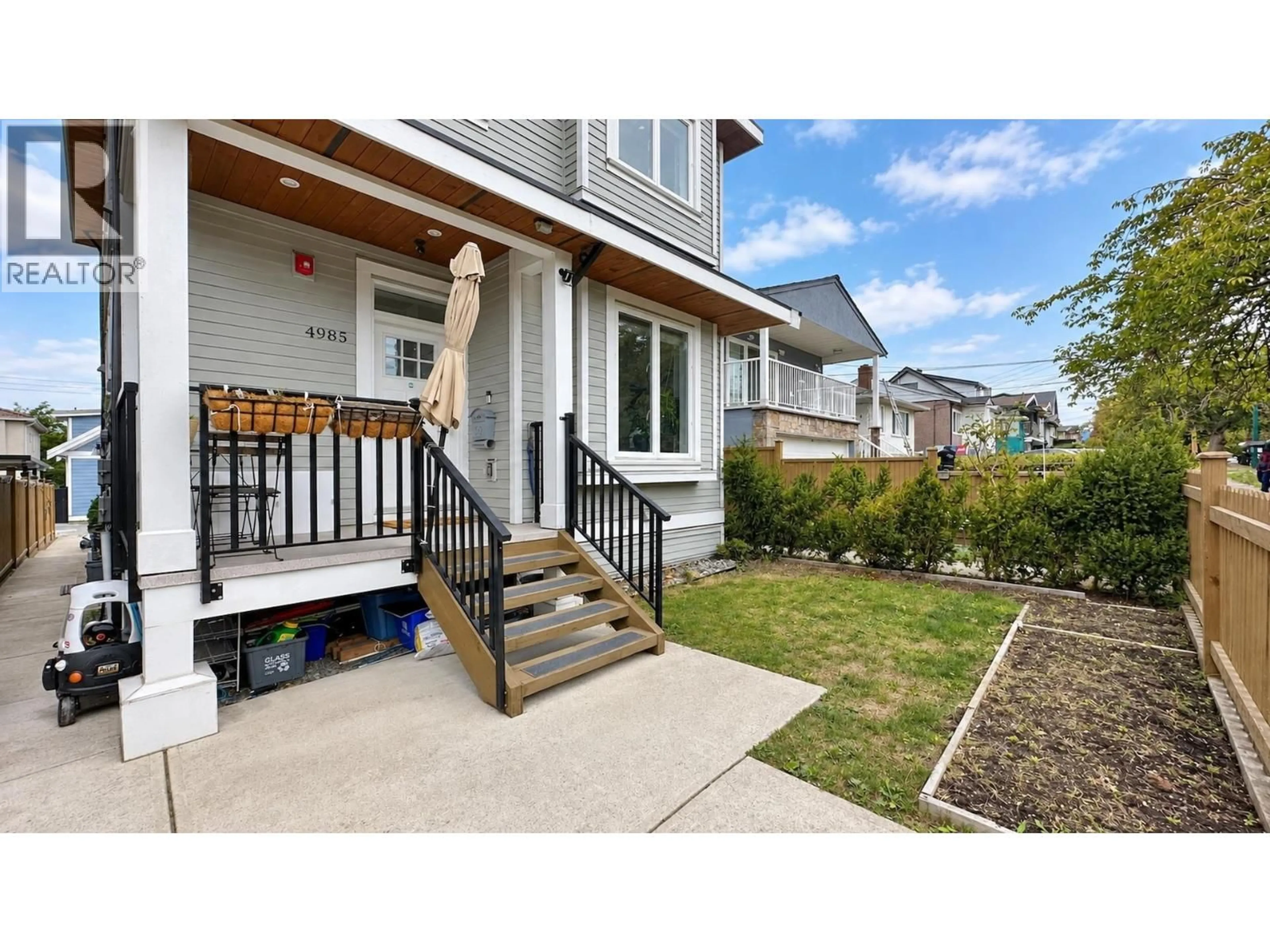 Home with vinyl exterior material, street for 4985 MOSS STREET, Vancouver British Columbia V5R3T5