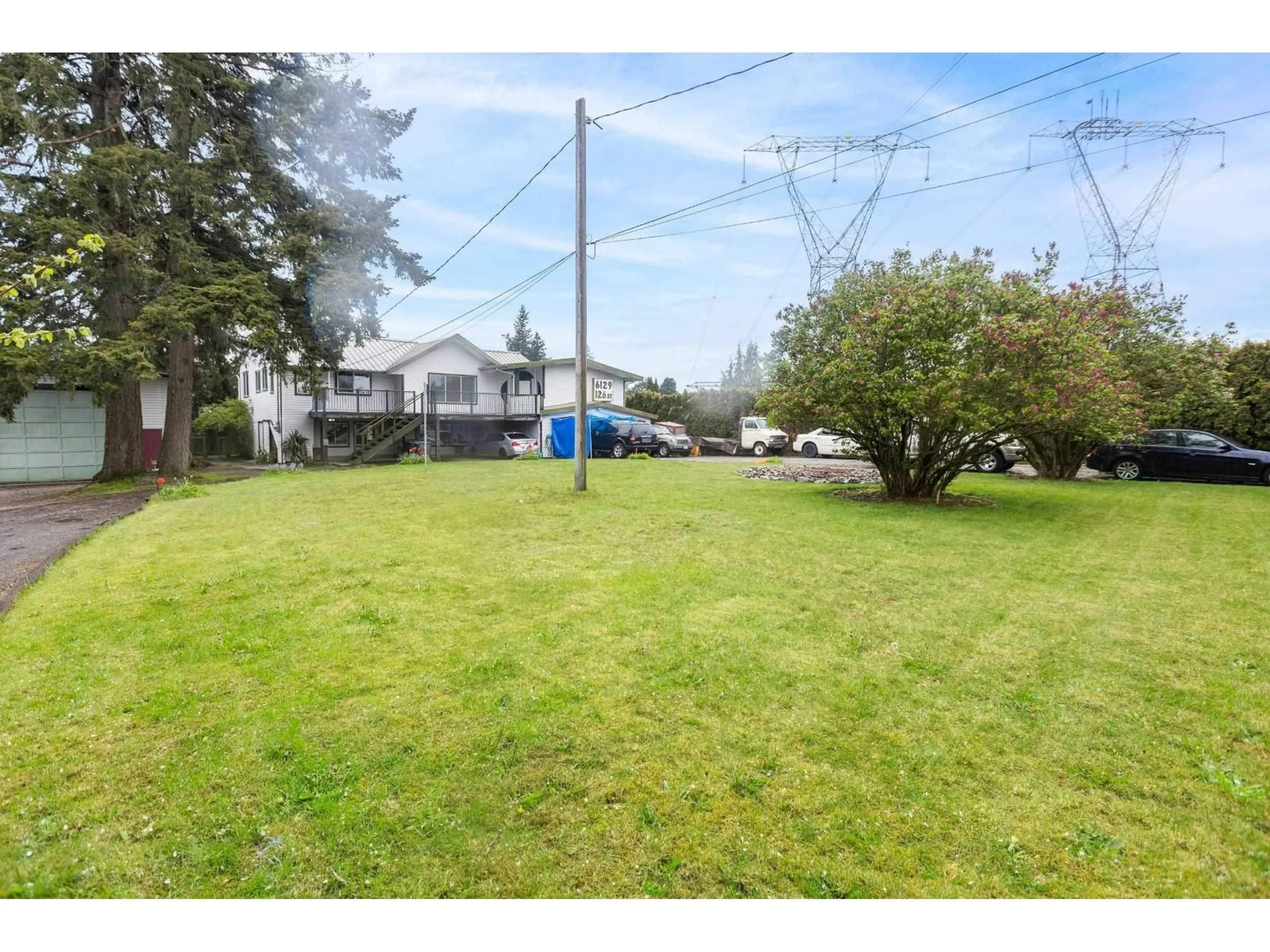 A pic from outside/outdoor area/front of a property/back of a property/a pic from drone, water/lake/river/ocean view for 6129 126 STREET, Surrey British Columbia V3X1V7