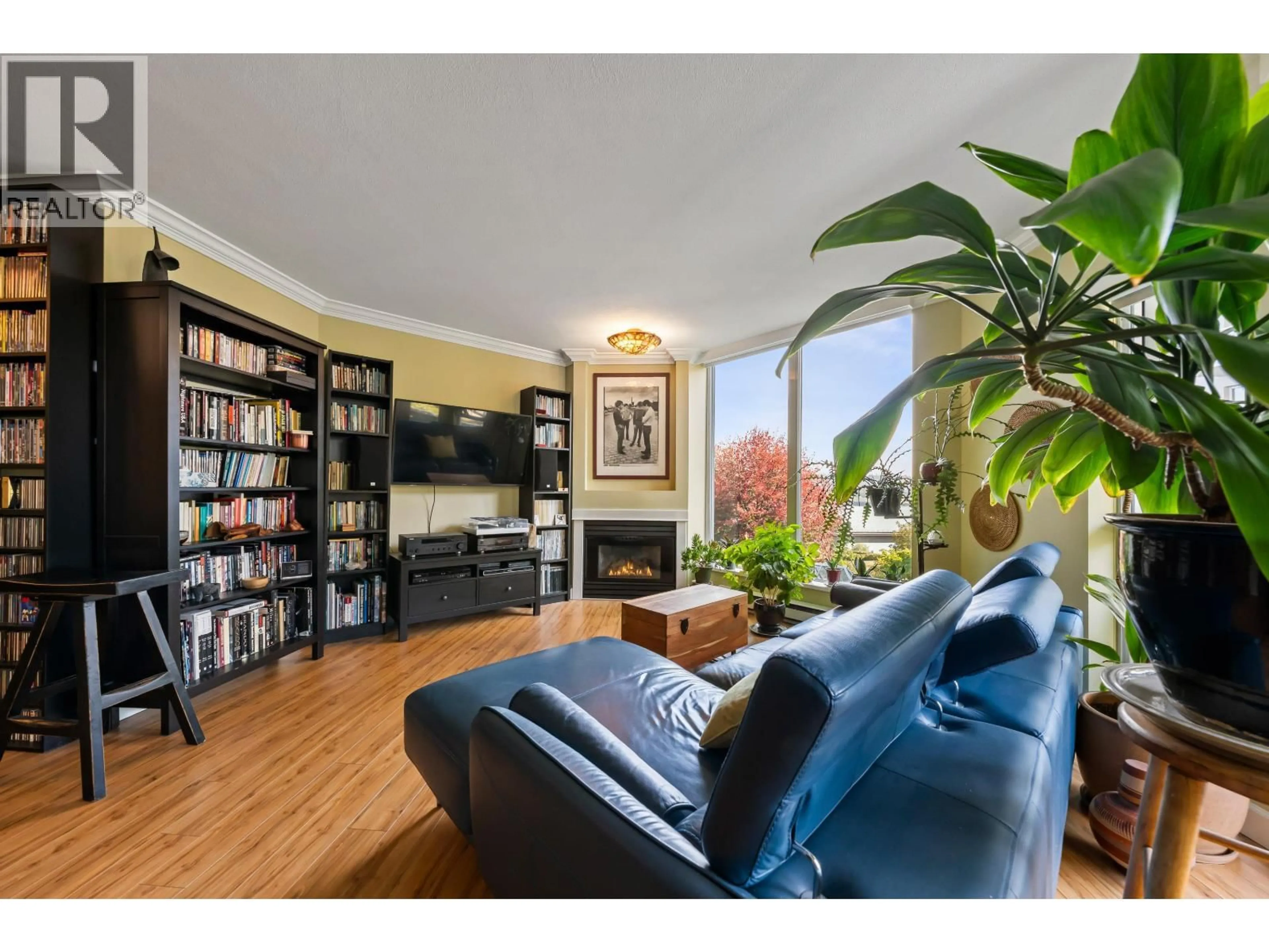 Living room with furniture, wood/laminate floor for 506 - 71 JAMIESON COURT, New Westminster British Columbia V3L5R4