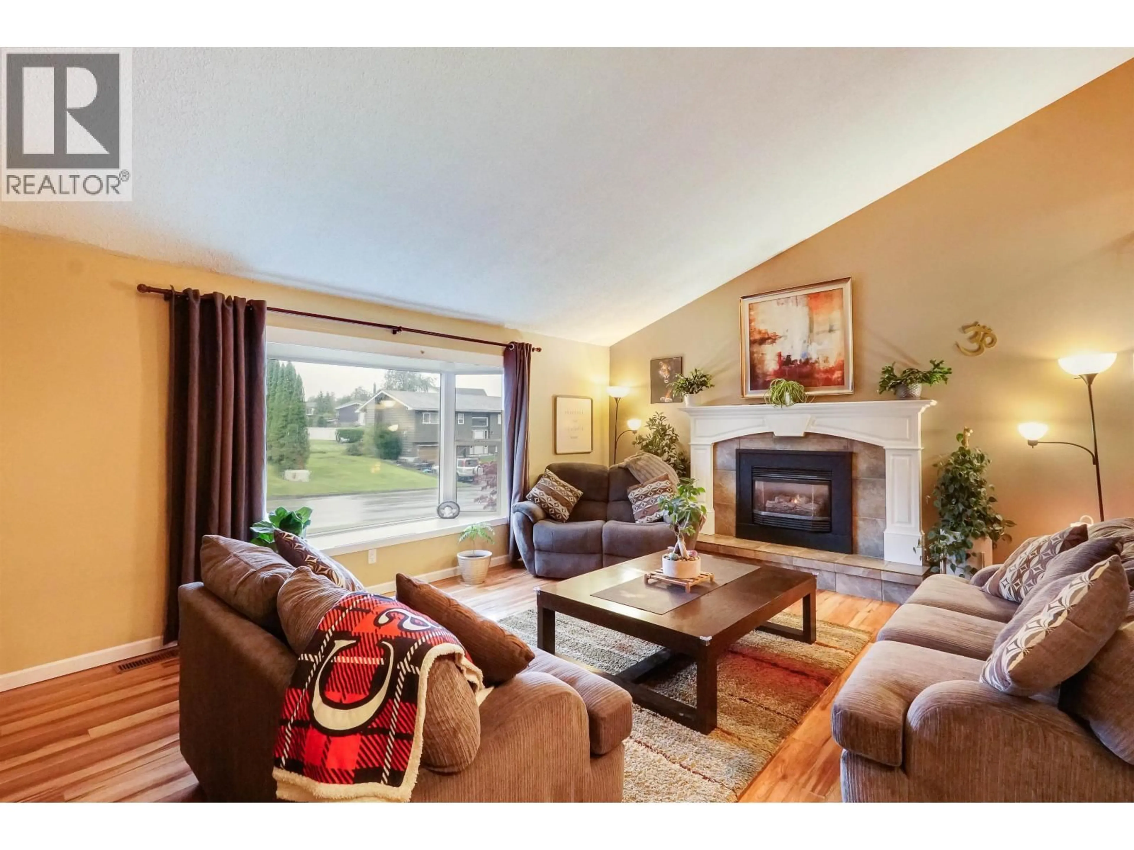 Living room with furniture, wood/laminate floor for 66 BANYAY STREET, Kitimat British Columbia V8C1P7