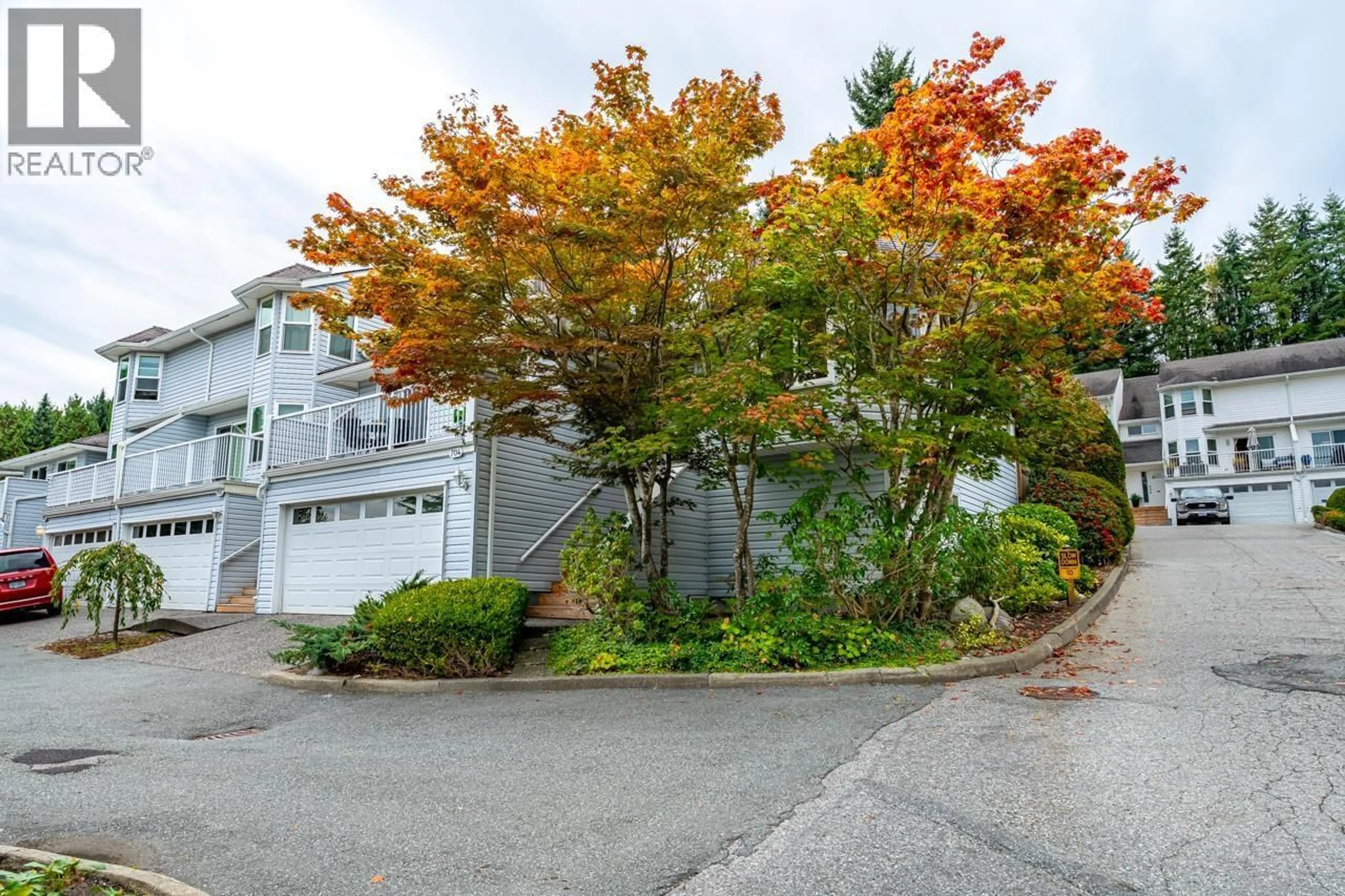 A pic from outside/outdoor area/front of a property/back of a property/a pic from drone, street for 704 - 1180 FALCON DRIVE, Coquitlam British Columbia V3E2K7