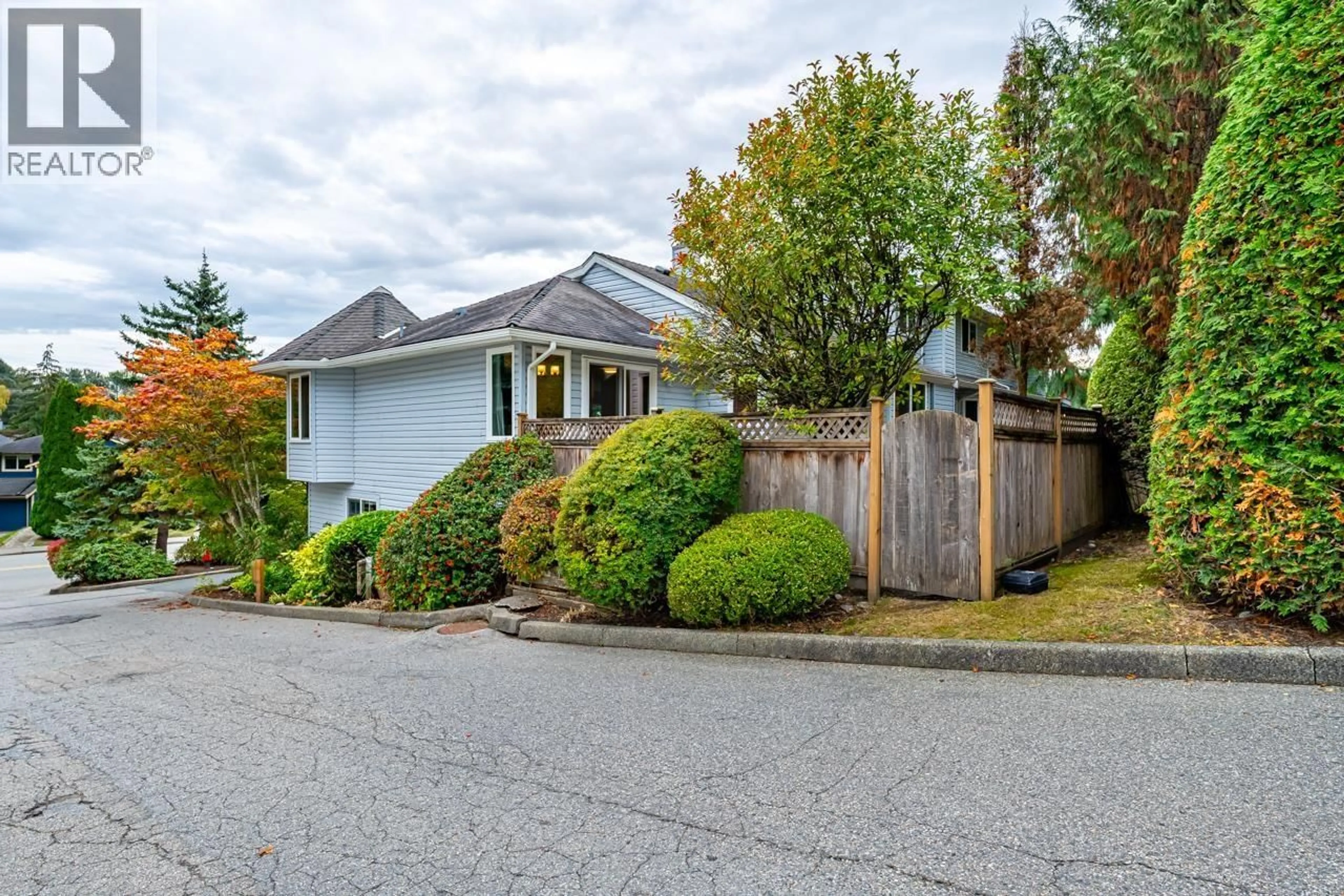 Home with vinyl exterior material, street for 704 - 1180 FALCON DRIVE, Coquitlam British Columbia V3E2K7