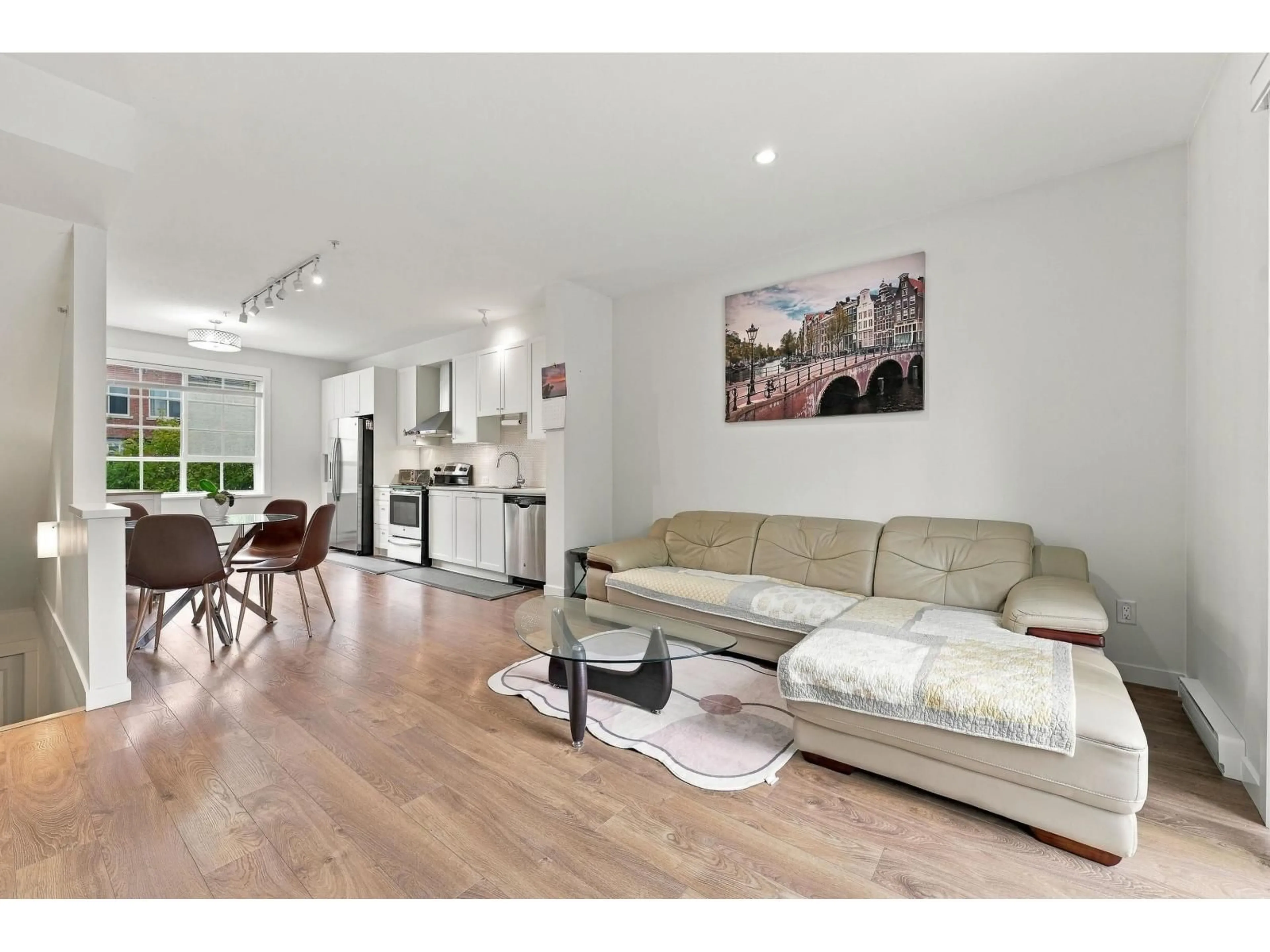 Living room with furniture, wood/laminate floor for 23 - 8438 207A STREET, Langdale British Columbia V2Y0N8