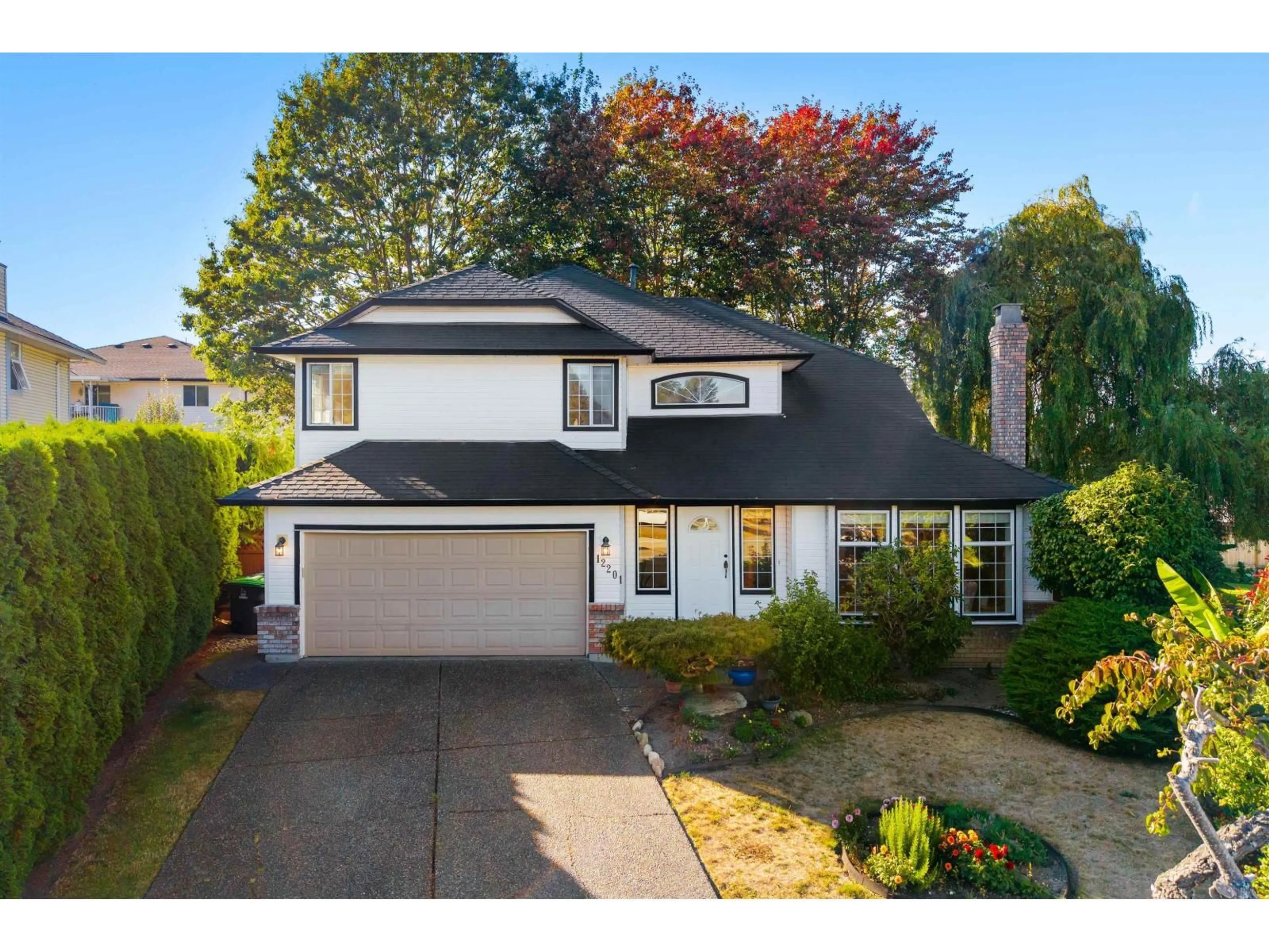 Home with vinyl exterior material, street for 12201 67A AVENUE, Surrey British Columbia V3W0L9